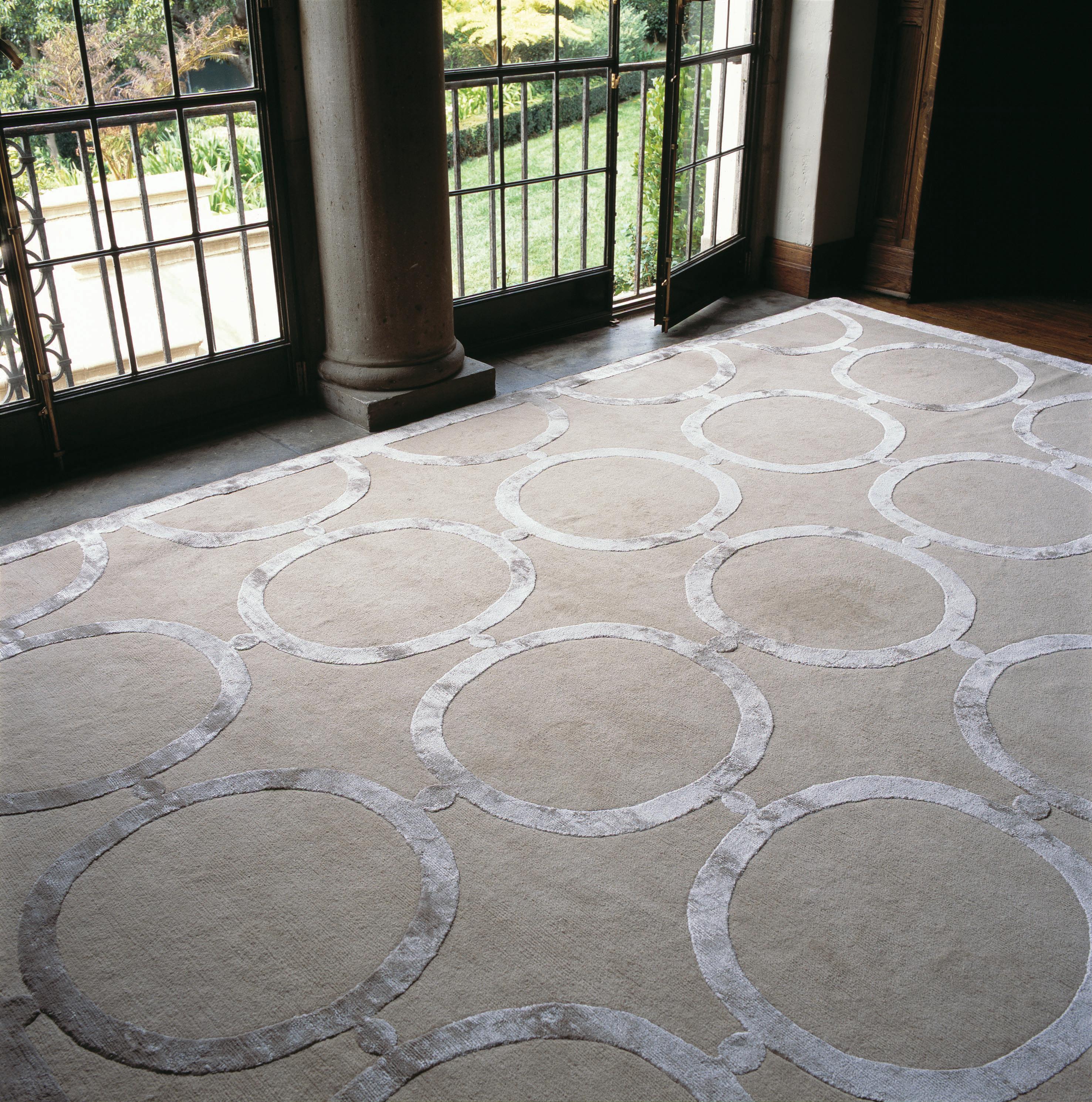 The Catella rug is a classical design, strict and sophisticated. It adds glamour to any room. Emily Todhunter. This is something of an understatement, as Catella has been The Rug Company's most successful design of recent years. It has a color