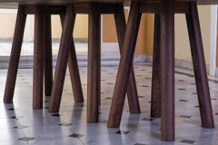 Caterpillar Dining Table Featuring 12 Legs, Blackened Solid Oak.