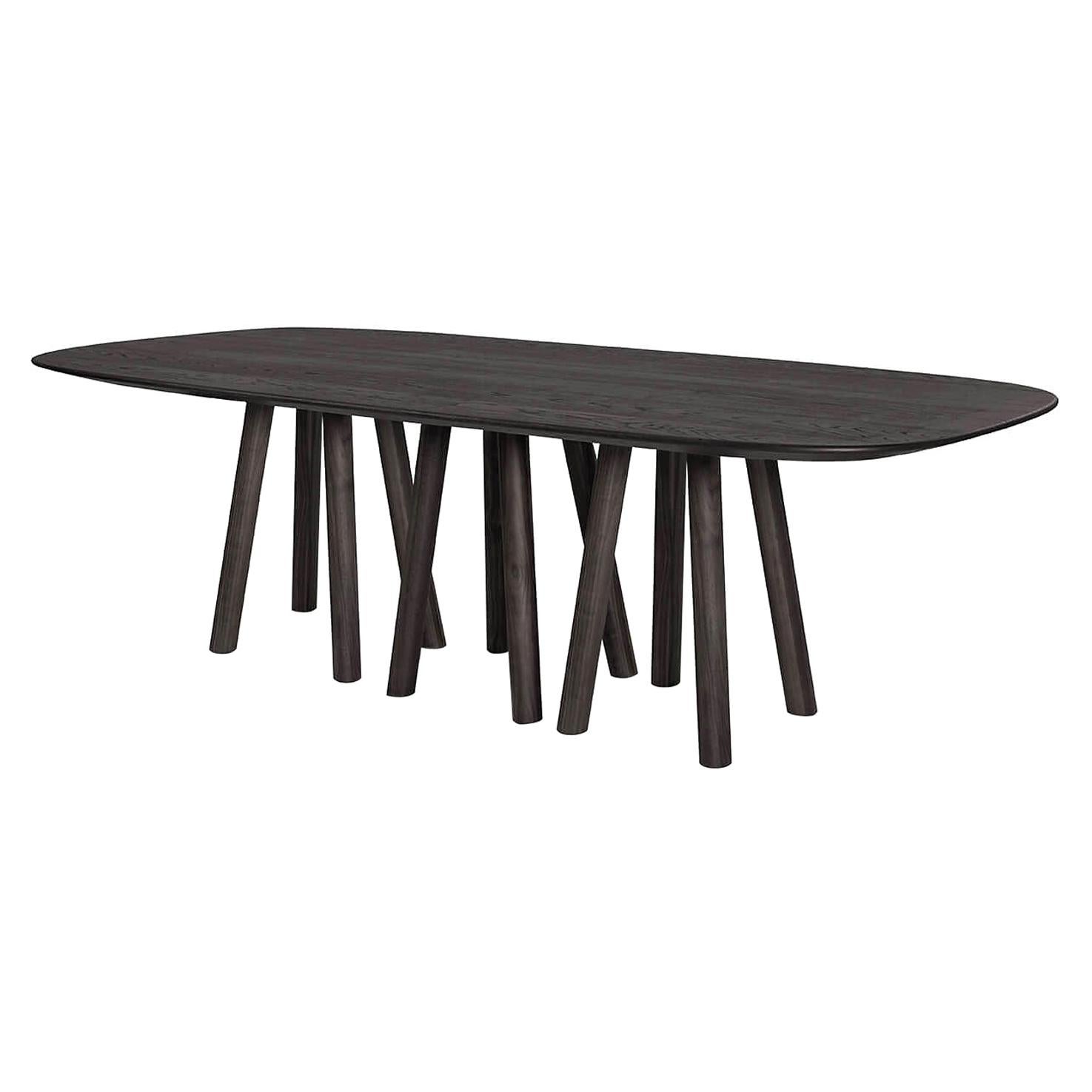 Caterpillar Dining Table Featuring 12 Legs, Blackened Solid Oak.