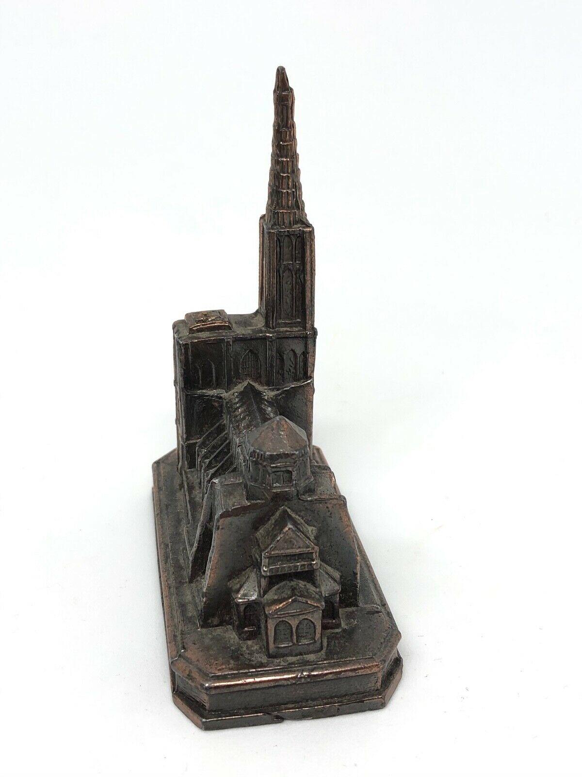 A 1950s souvenir building architectural model. Some wear with a nice patina, but this is old-age. Made of metal. A beautiful nice desktop item or just a display item in your collections of souvenirs from around the world.

 