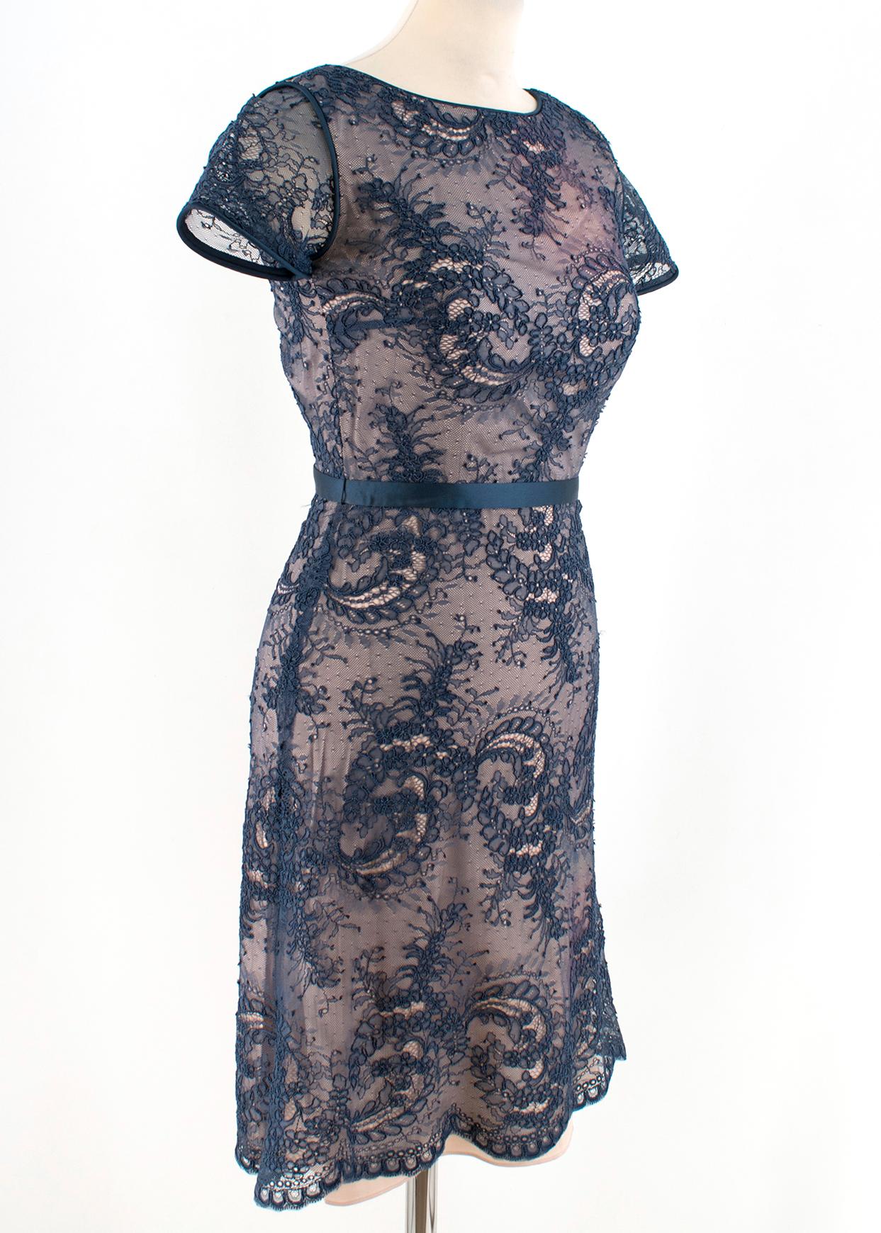 Catherine Deane Belle Lace Short Dress

- Indigo & Almond short dress
- Lace inserts
- Lightweight
- Sheer short sleeved
- Crew neck
- Slightly padded cups
- Centre-back hook-and-eye and zip fastening
- 58% nylon and 42% rayon.

Please note, these