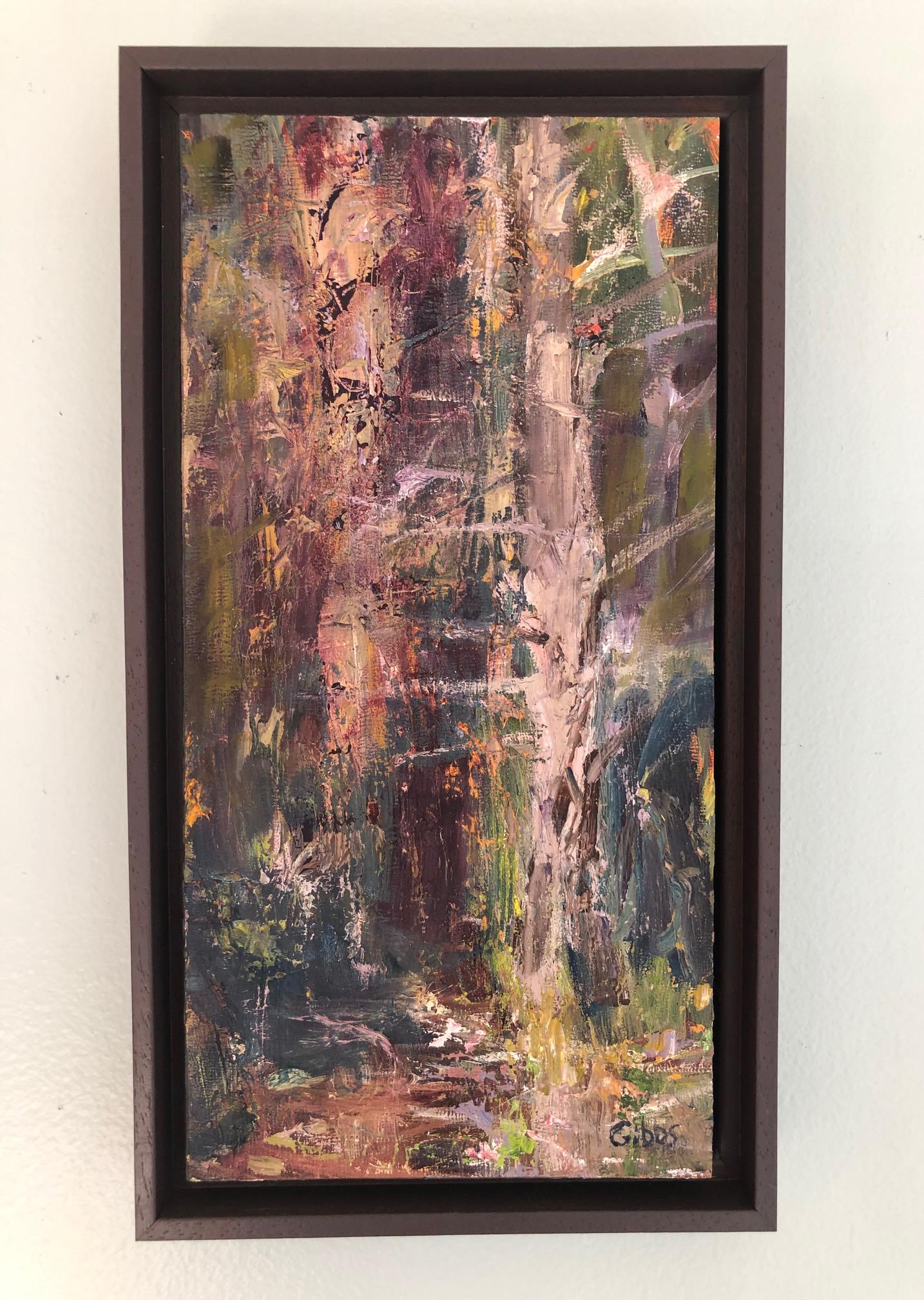 “Essence of the Forest” by Catherine Picard-Gibbs is an abstracted nature scene of a forest. This gestural oil painting on panel is painted in a palette of grays, browns, purples and greens, and measures 12 x 6 x 0.75 inches. The textural painting