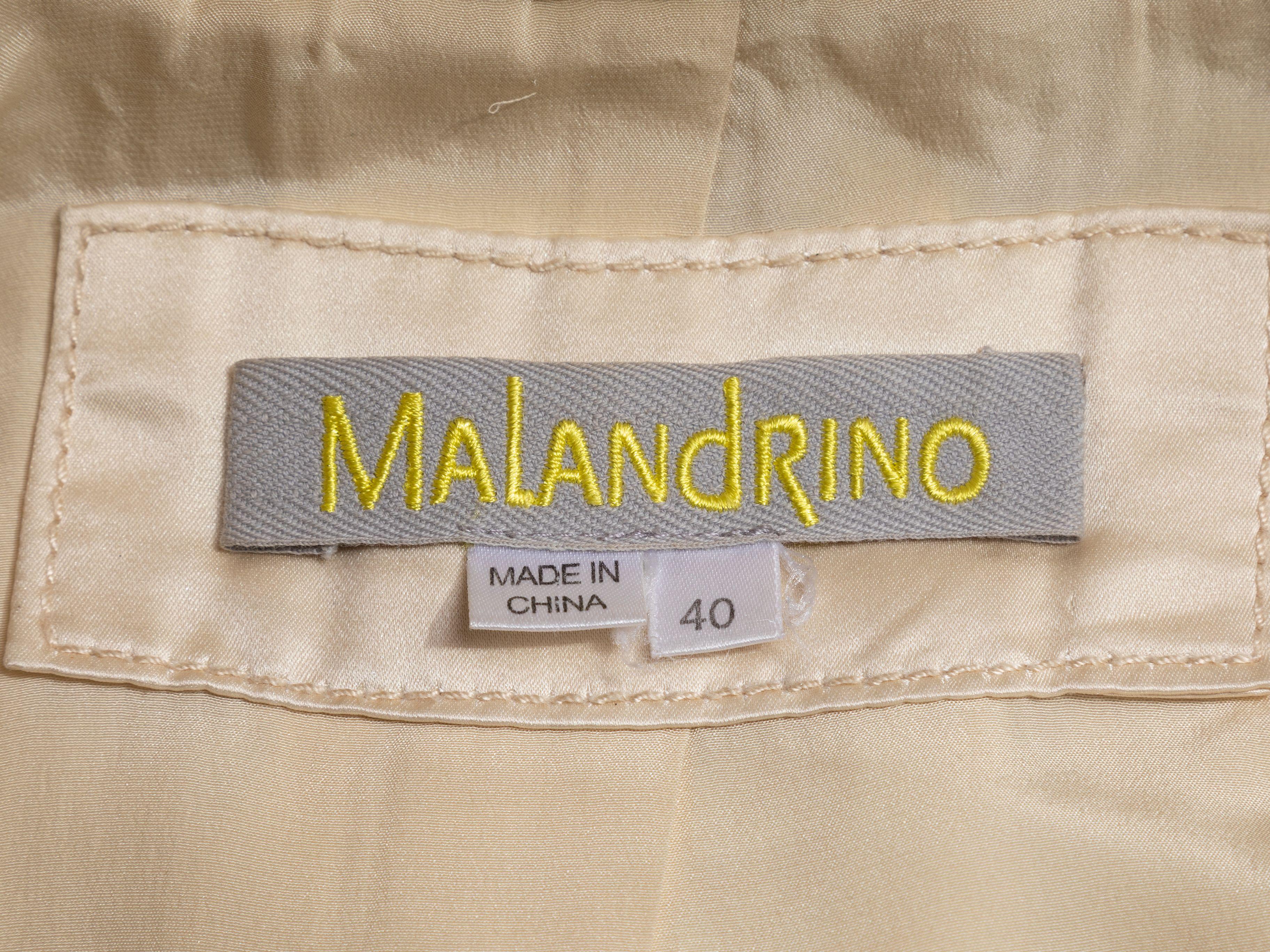 Product Details: Cream quilted duchesse satin fur-trimmed double-breasted jacket by Catherine Malandrino. V-neckline. Dual hip pockets. Button closures at front. Designer size 40. 30