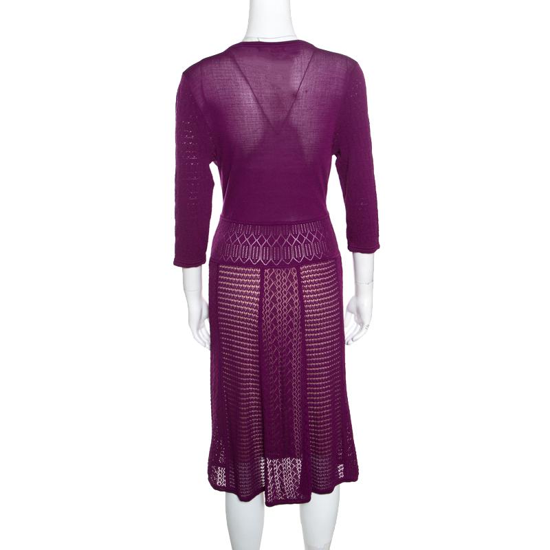 This grape purple dress from Catherine Malandrino is posh and it is meant to perfectly complement a woman's body. It has a perforated design with a plunging neckline and long sleeves. You'll look amazing when you wear it with a beige bodysuit inside