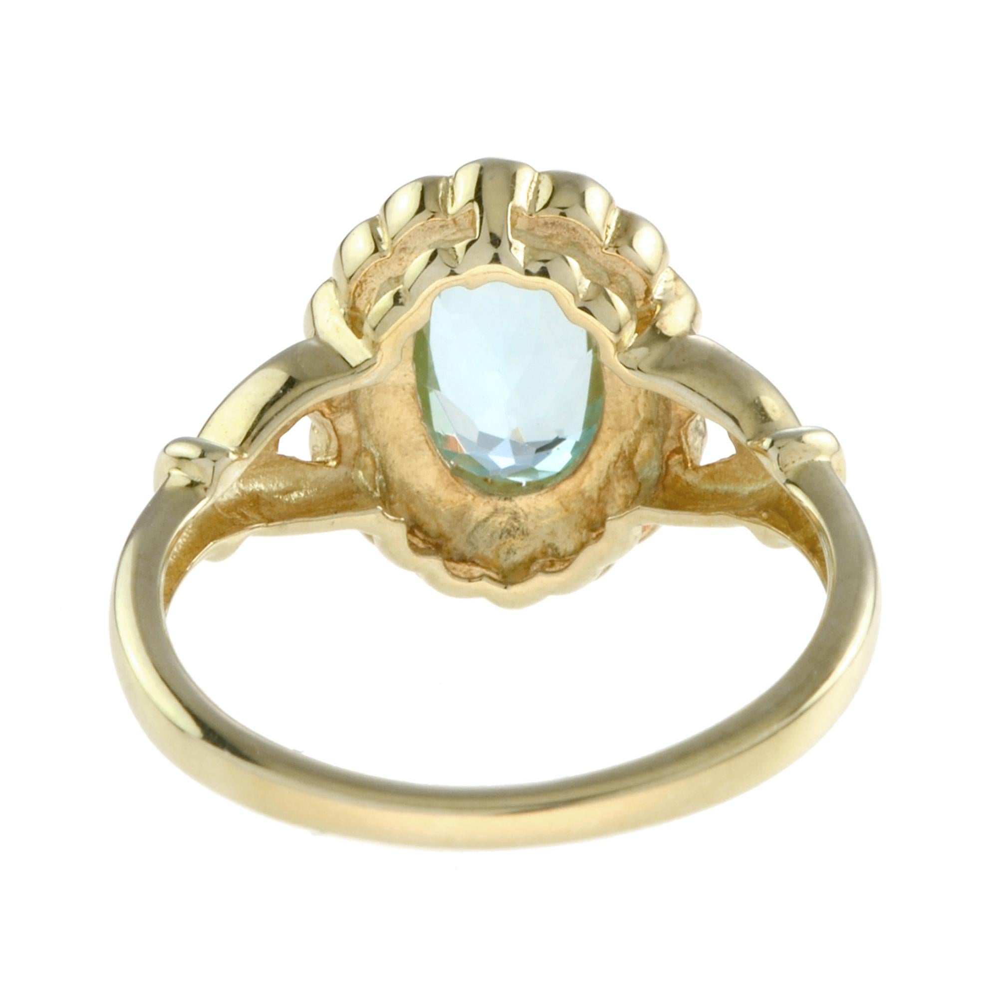 For Sale:  Natural Oval Blue Topaz with Pearl Halo Ring in 14K Yellow Gold 5