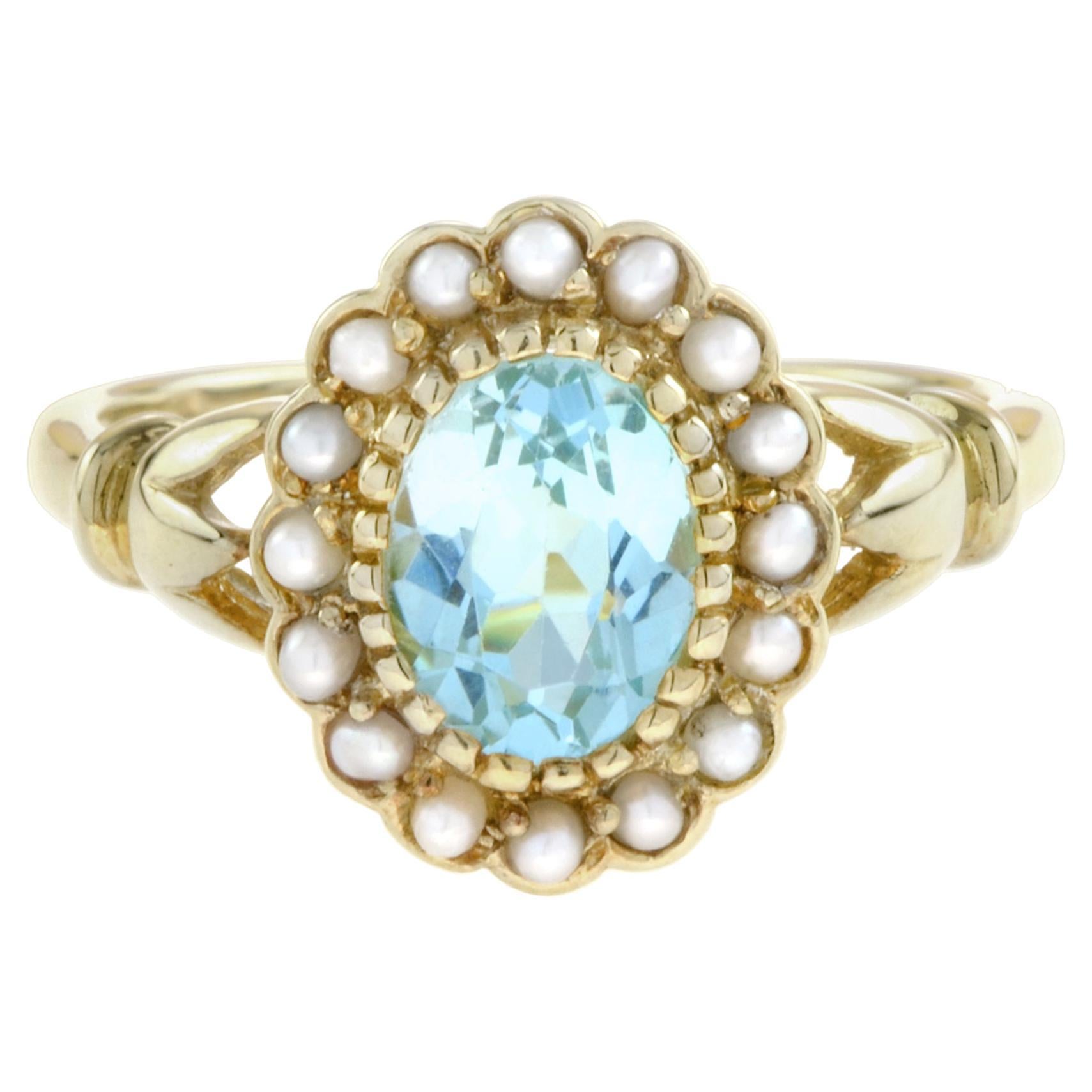 For Sale:  Natural Oval Blue Topaz with Pearl Halo Ring in 14K Yellow Gold