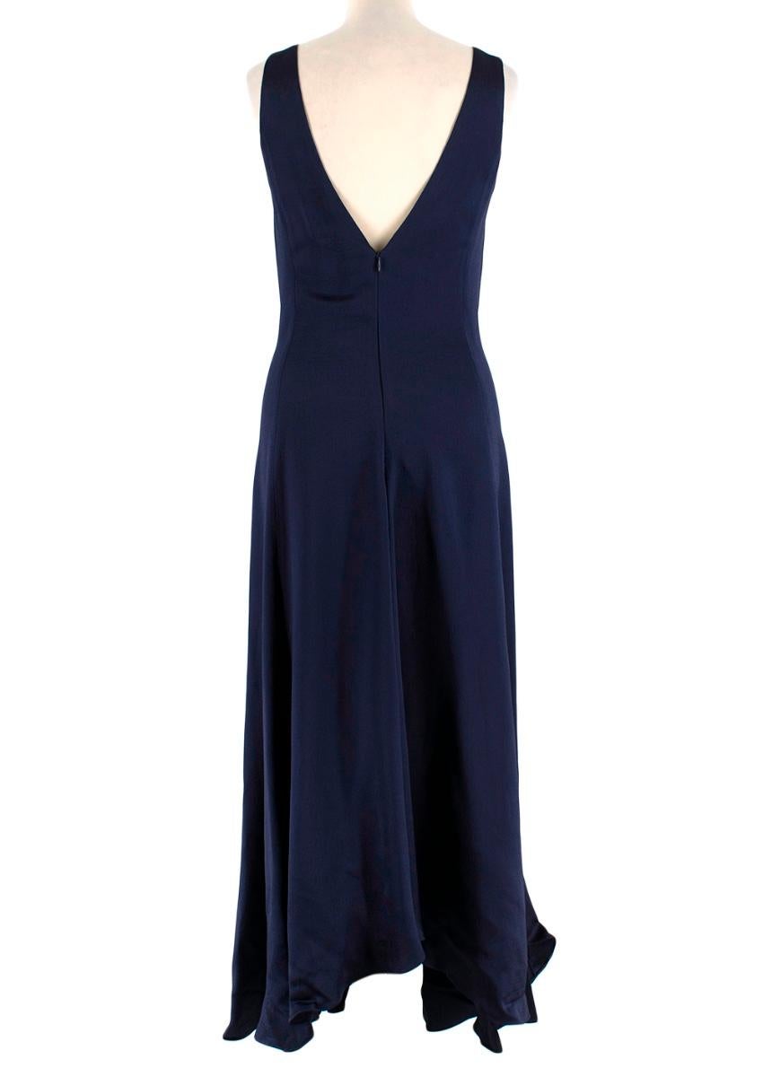 Catherine Quinn blue silk satin handkerchief dress

Sleeveless with a V neck 
- zip at the back 
- heavy weight
-Midnight blue colour
100% Textured Viscose

Please note, these items are pre-owned and may show signs of being stored even when unworn