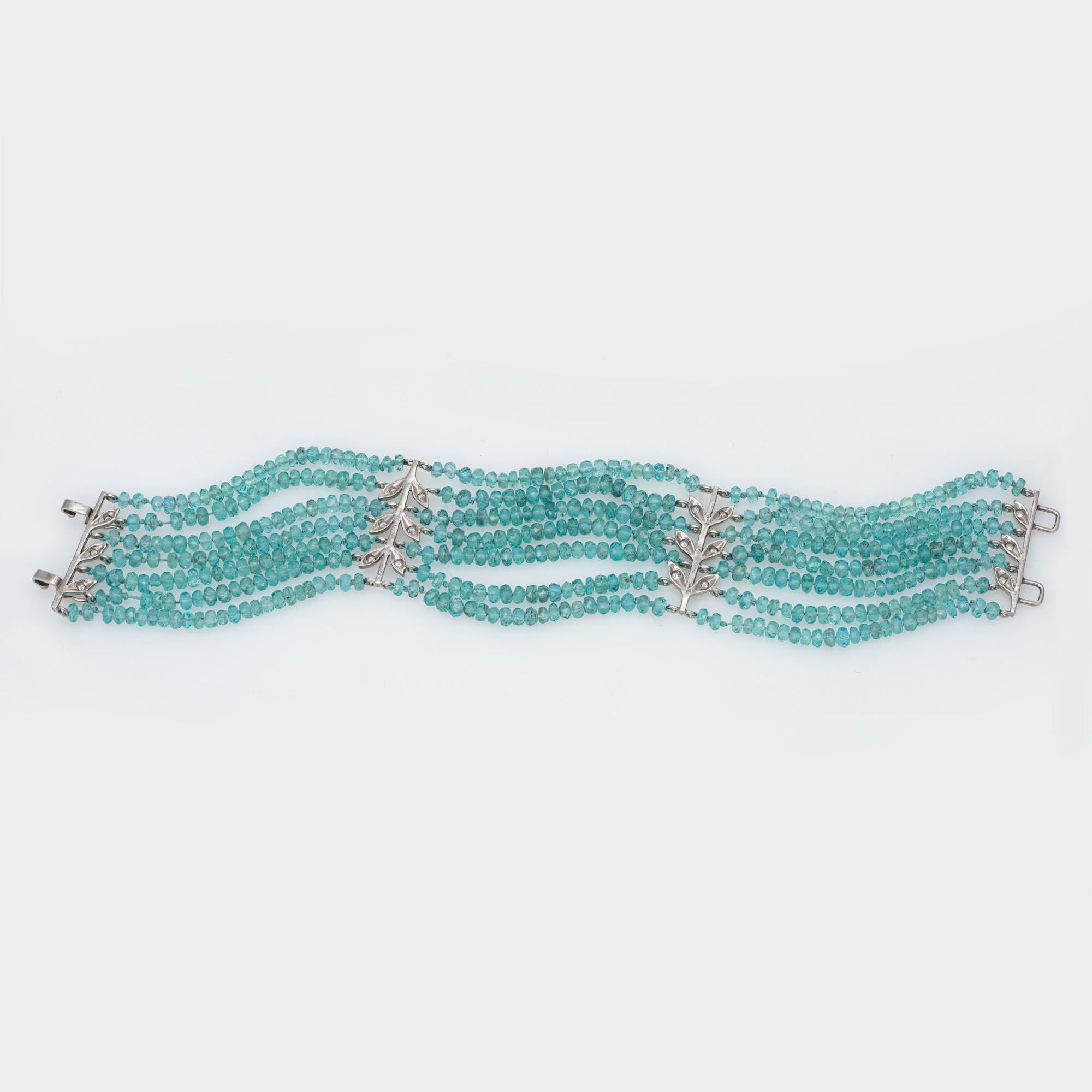 Finely detailed pre-owned Cathy Waterman 7 strand aquamarine & diamond bracelet crafted in 900 platinum. 

Seven strands of faceted aquamarine measure (average) 3mm. The diamonds total an estimated 0.18 carats (estimated at H-I color and VS2-SI1