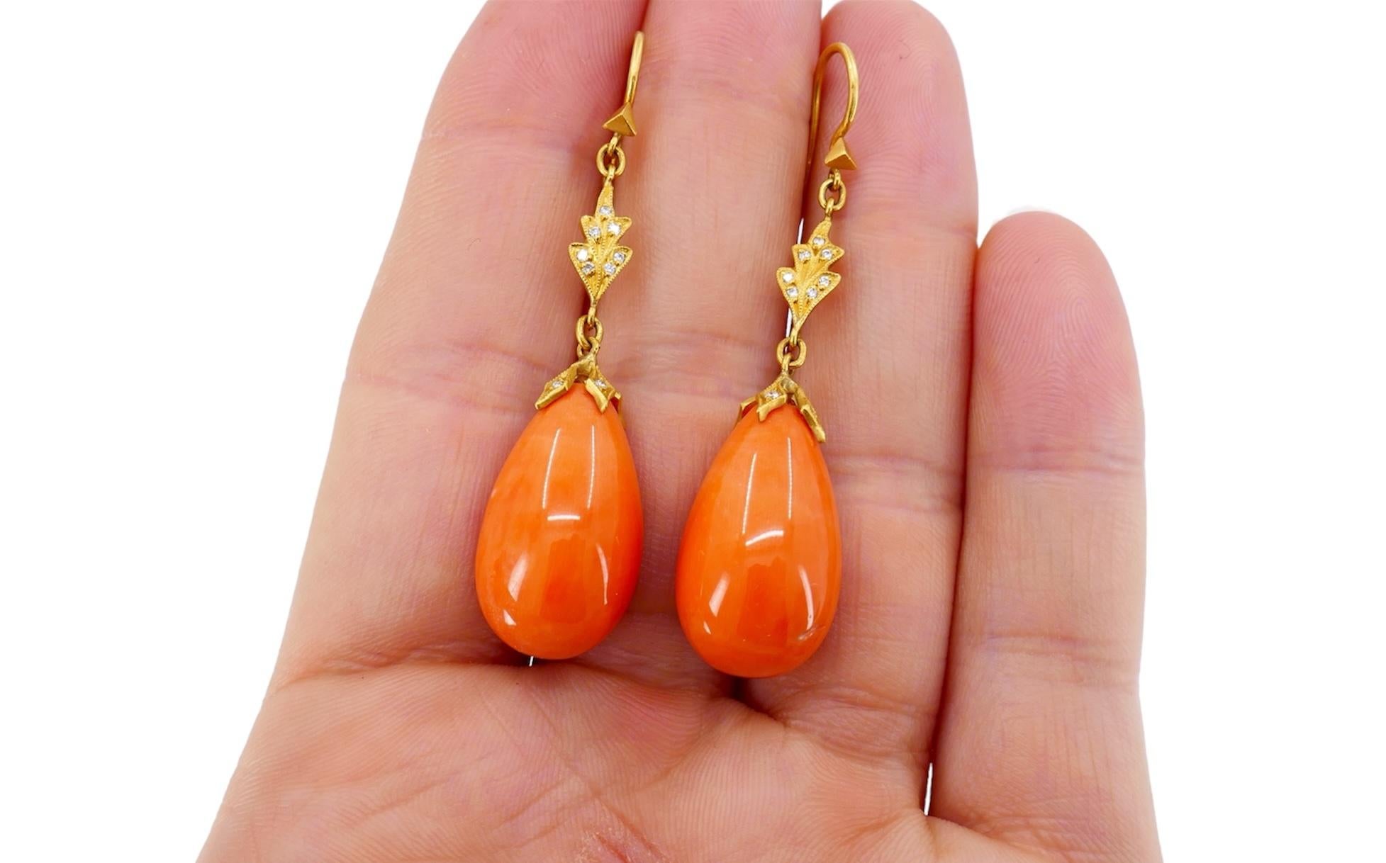 Crafted by designer Cathy Waterman in the 1990s, these Coral drop earrings exude elegance and sophistication. Adorned with 0.08 carats of round brilliant cut diamonds, delicately set in 22k gold, they epitomize timeless luxury. With dimensions of