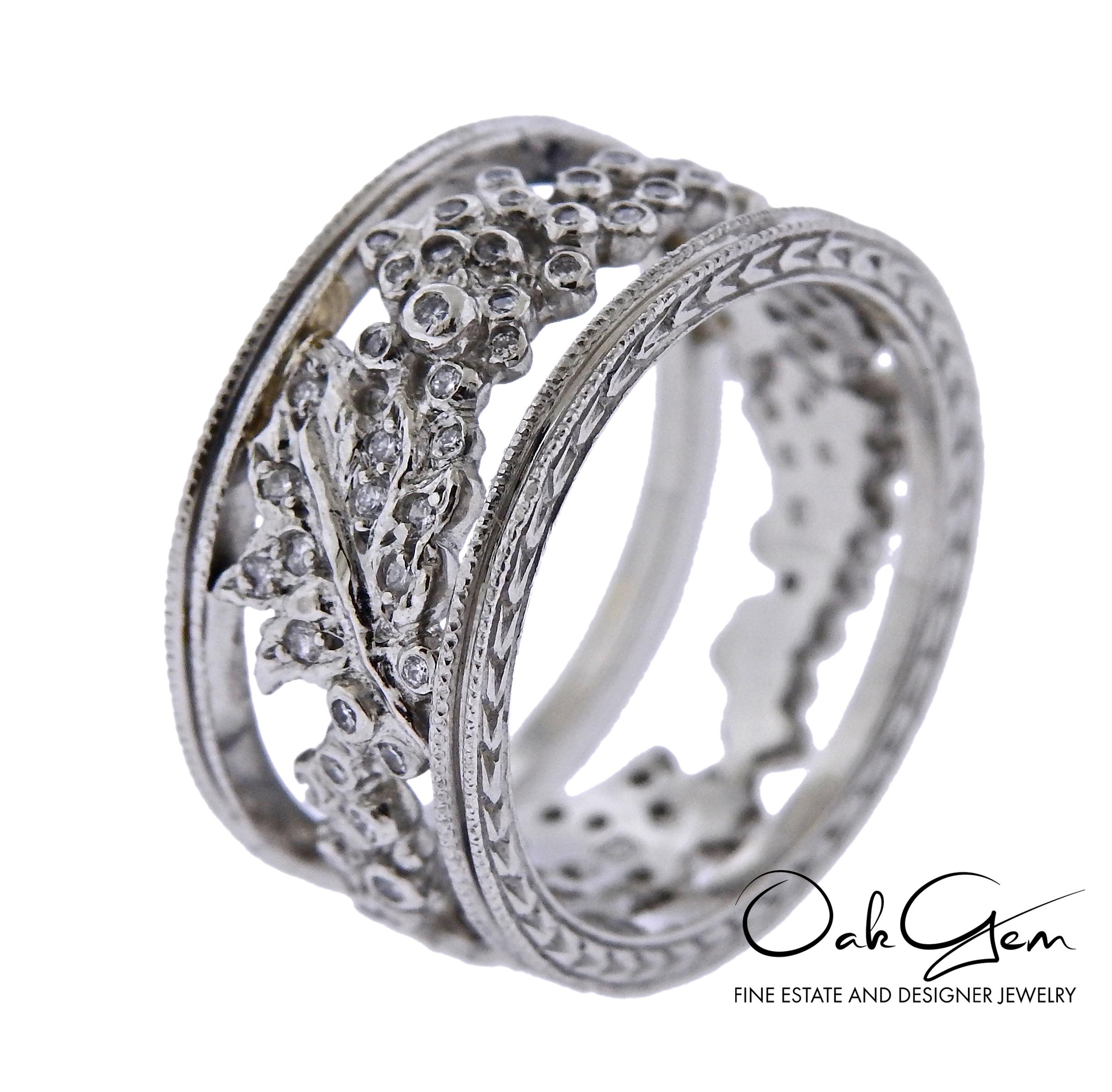 Cathy Waterman wide platinum and diamond band ring featuring open carved floral design. ring size 7, ring is 10.3mm wide, weighs 11.8 grams. Adorned with approx. 0.50ctw in diamonds. Marked with 900pt, Waterman hallmark.