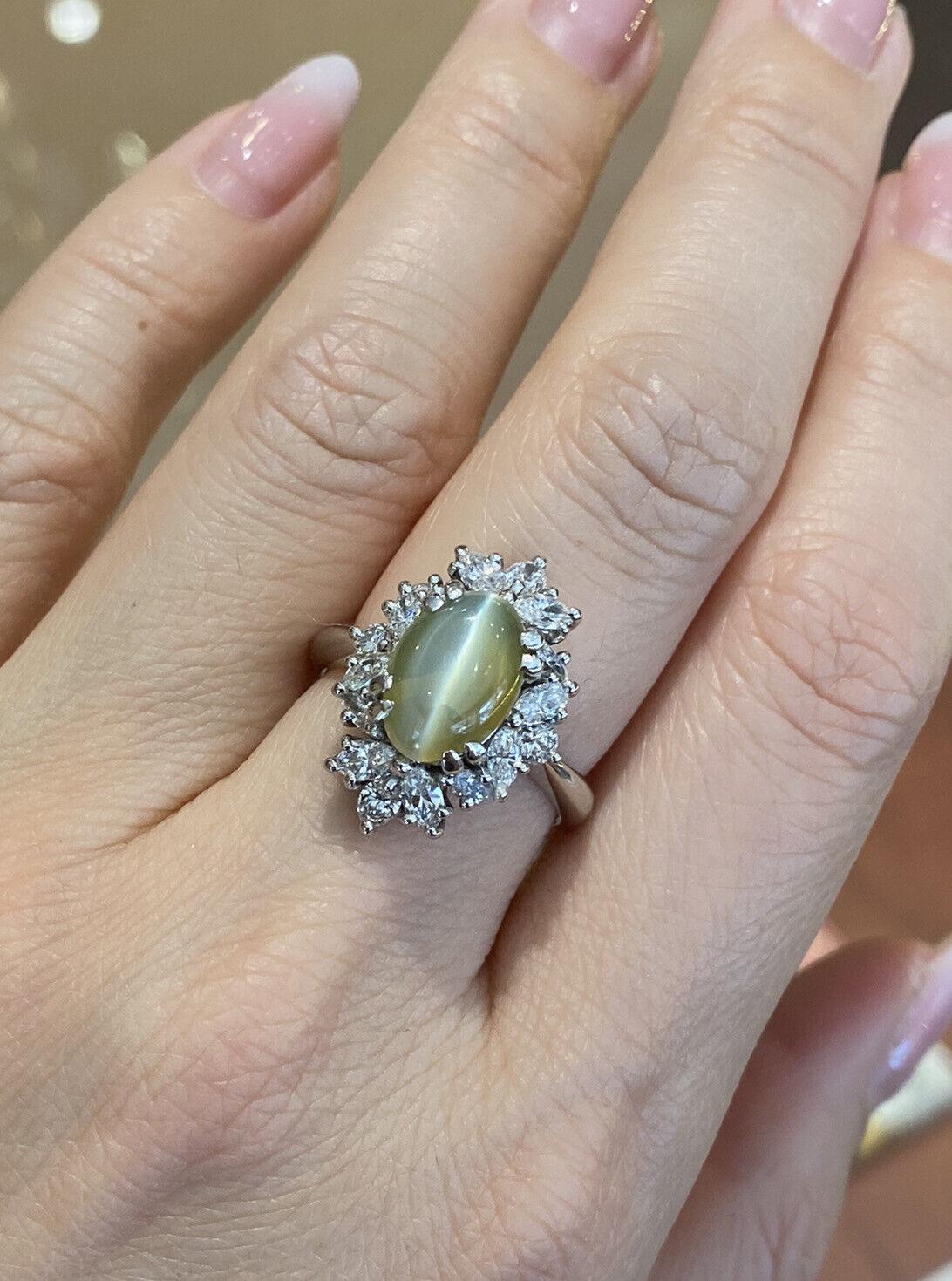 Oval Cut Cat's Eye Chrysoberyl and Diamond Ring in Platinum For Sale