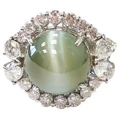 Cat's Eye Chrysoberyl Cabochon and White Diamond Round Ring in Platinum