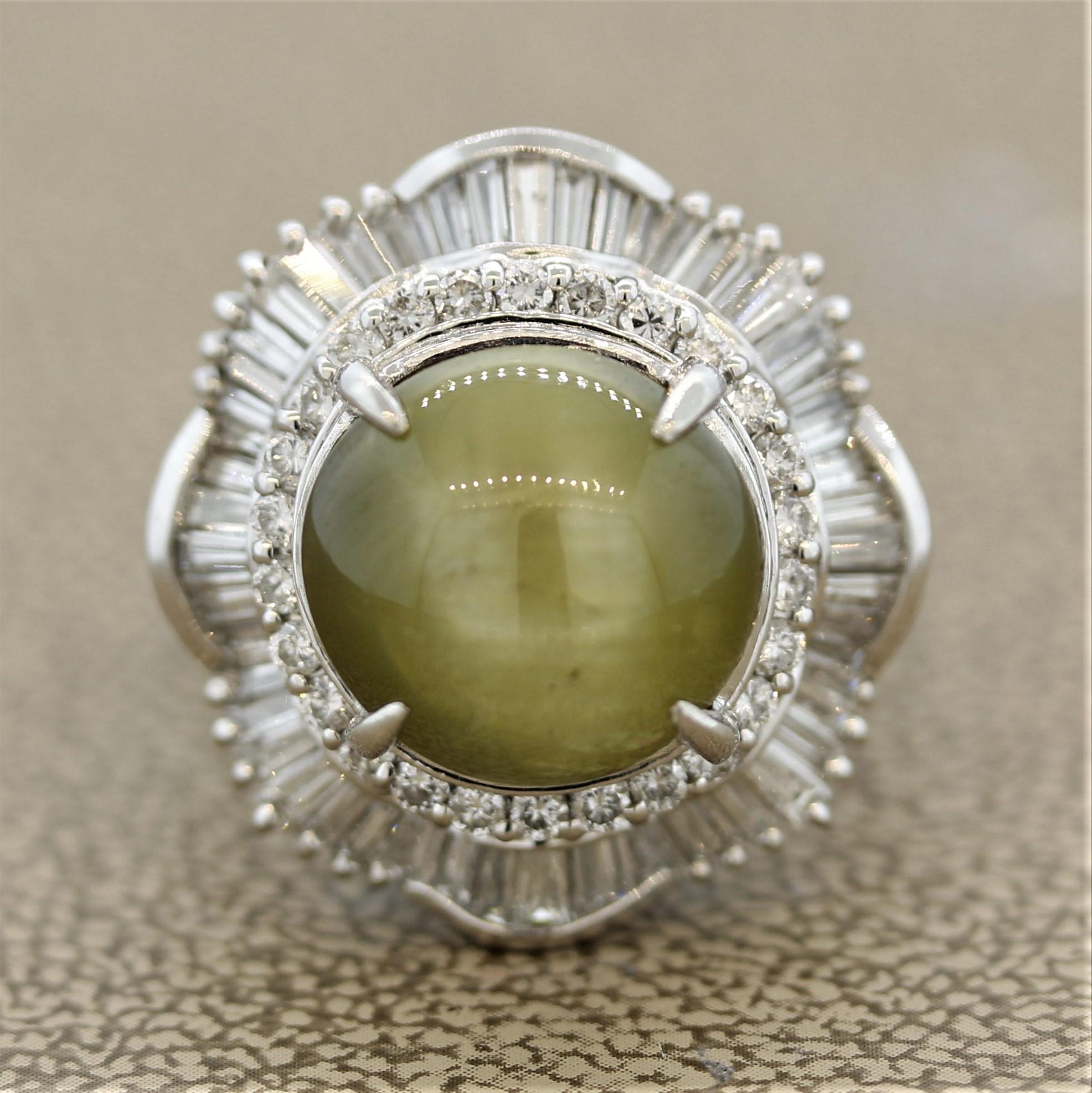 A stylish ring featuring a large 11.74 carats cat’s eye chrysoberyl showing an “eye” (chatoyancy) over its surface as light hits the stone. It is surrounded by 1.17 carats of round brilliant and baguette cut diamonds set in a unique pattern around