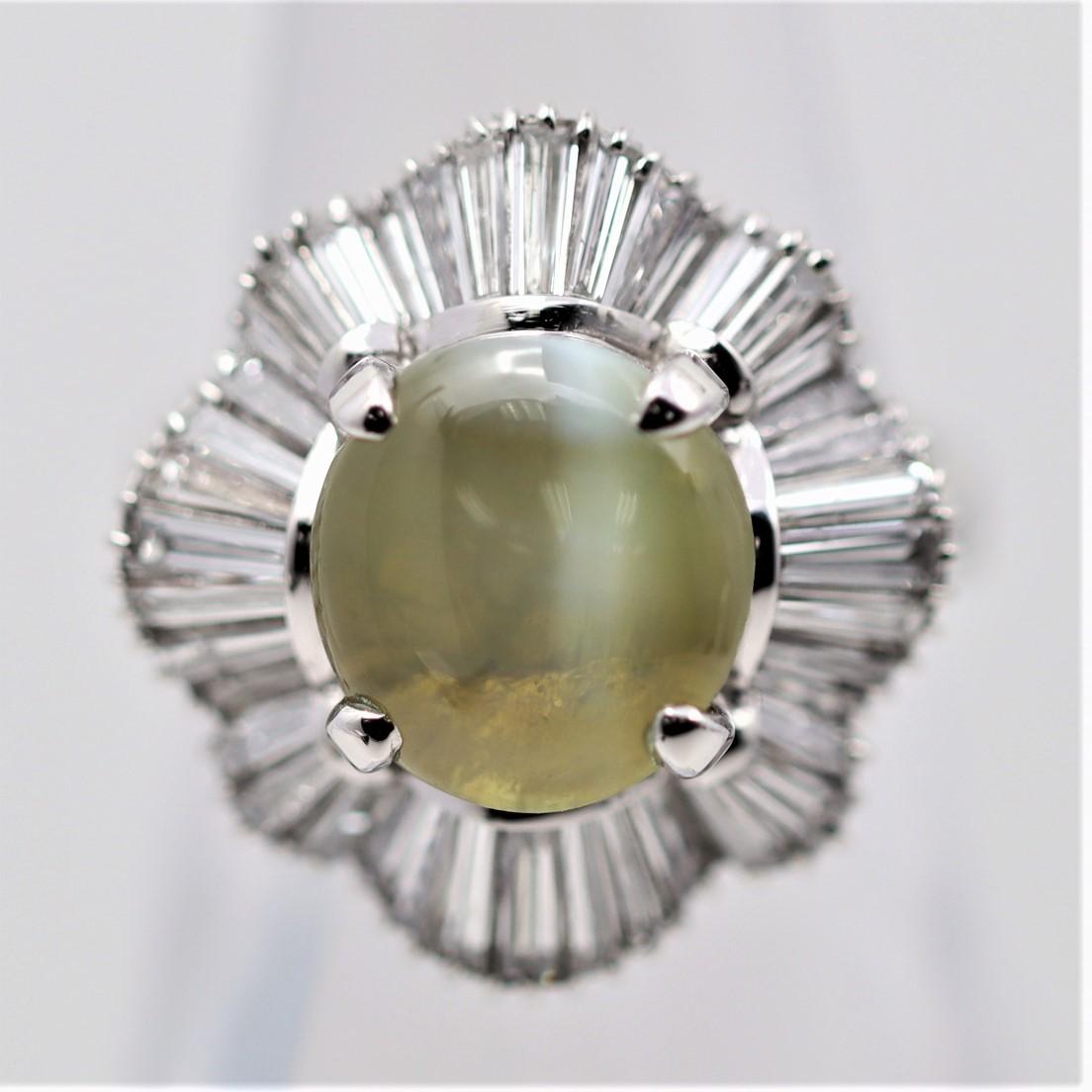 A lovely fine quality, platinum made, ring featuring a gem 6.78ct cats eye chrysoberyl with fantastic chatoyancy (cats eye effect). When a light hits the top of the chrysoberyl, a slime and fine chatoyant “eye” can be seen across the stone. It is