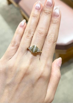 Anello con crisoberillo a occhio di gatto e diamante incastonato in oro 18K