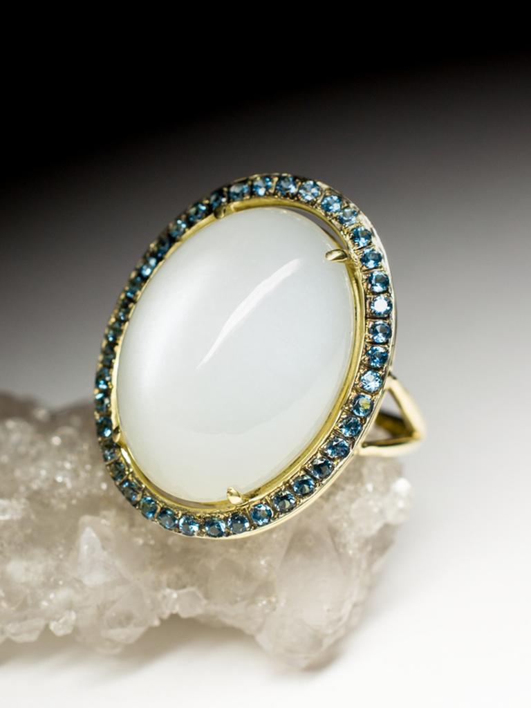 14k yellow gold ring with natural moonstone with chatoyant (cat's eye effect) and 40 topaz 