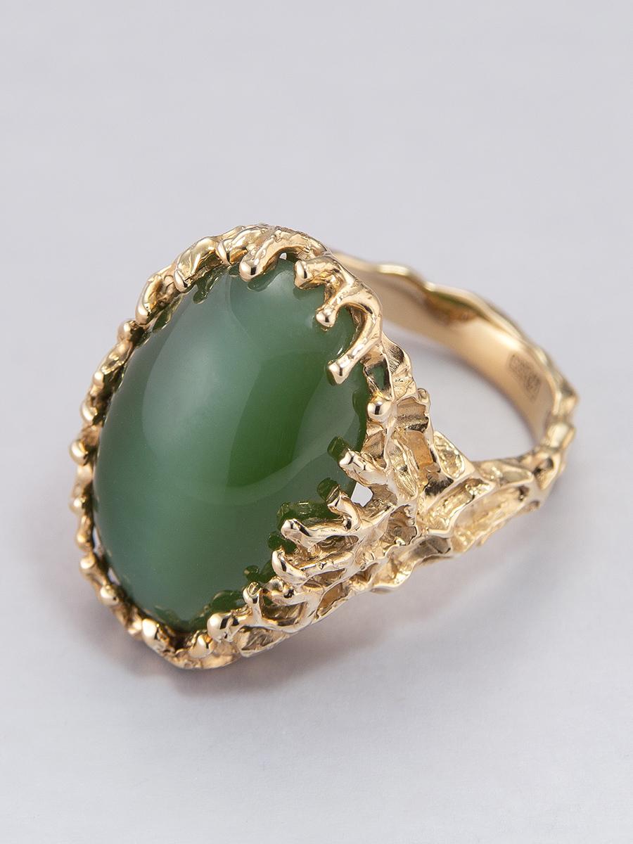 14K yellow gold unisex ring with natural green Nephrite (Jade) with cat's eye effect
stone weight - 19.6 carats
stone measurements - 0.35 х 0.59 х 0.87 in / 9 х 15 х 22 mm
ring size - 7.25 US 
ring weight - 13.32 grams


We ship our jewelry