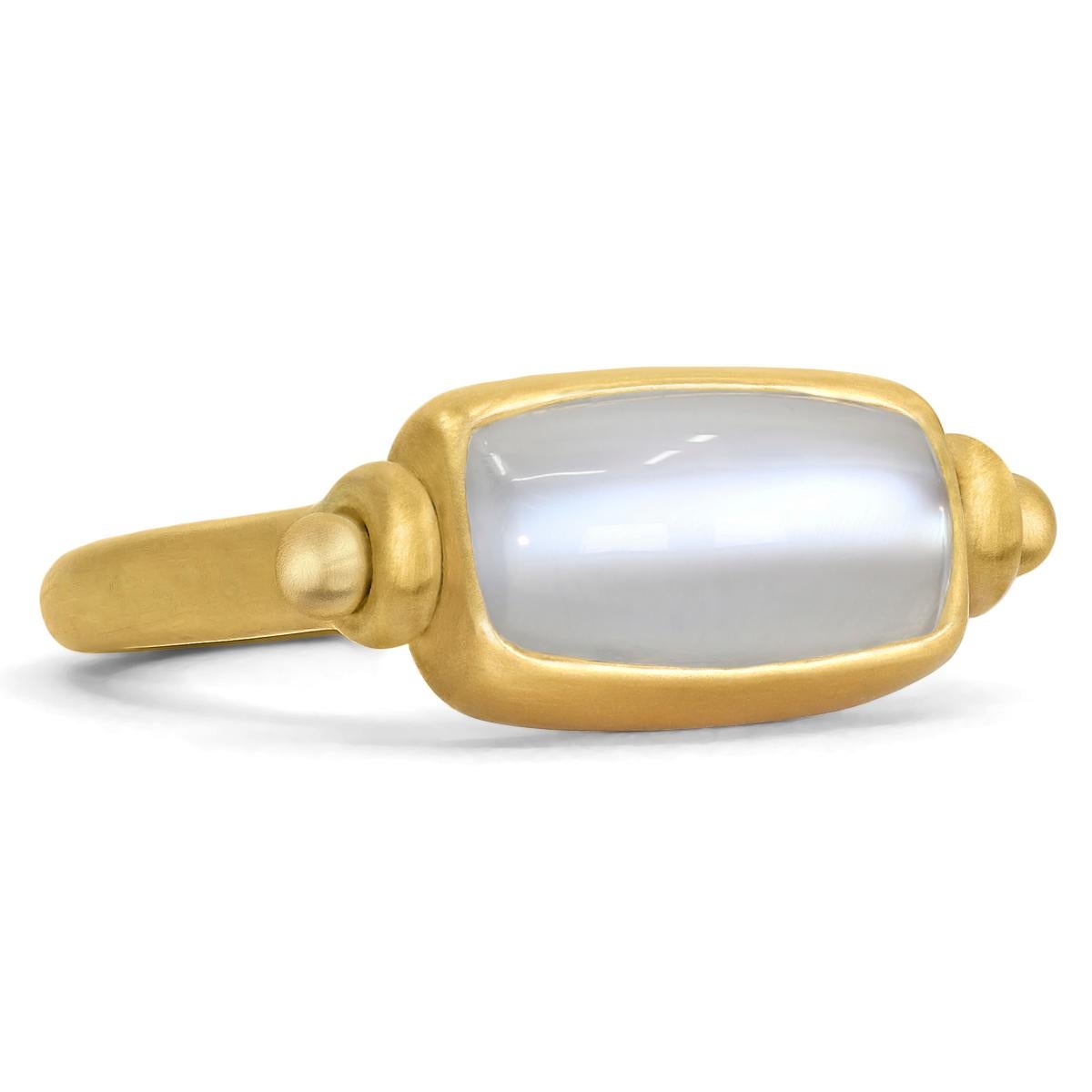 One of a Kind Swivel Ring handfabricated by acclaimed jewelry maker Denise Betesh, showcasing a magnificent natural 5.27 carat platinum cat's-eye moonstone sugarloaf cabochon bezel-set in the artist's luscious 22k yellow gold atop her signature 20k