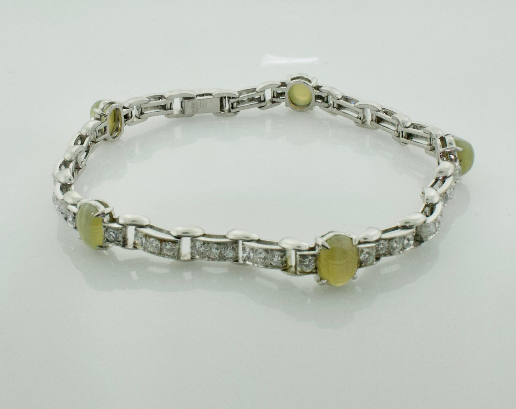 Catseye and Diamond Bracelet in Platinum Circa 1940 by Wasslikoff
Five Fine Chrysoberyl Catseyes Weighing 6.15 Carats Approximately 
55 Round Brilliant Cut Diamonds Weighing 2.35 Carats Approximately 
With Original Appraisal from 1946
Created by