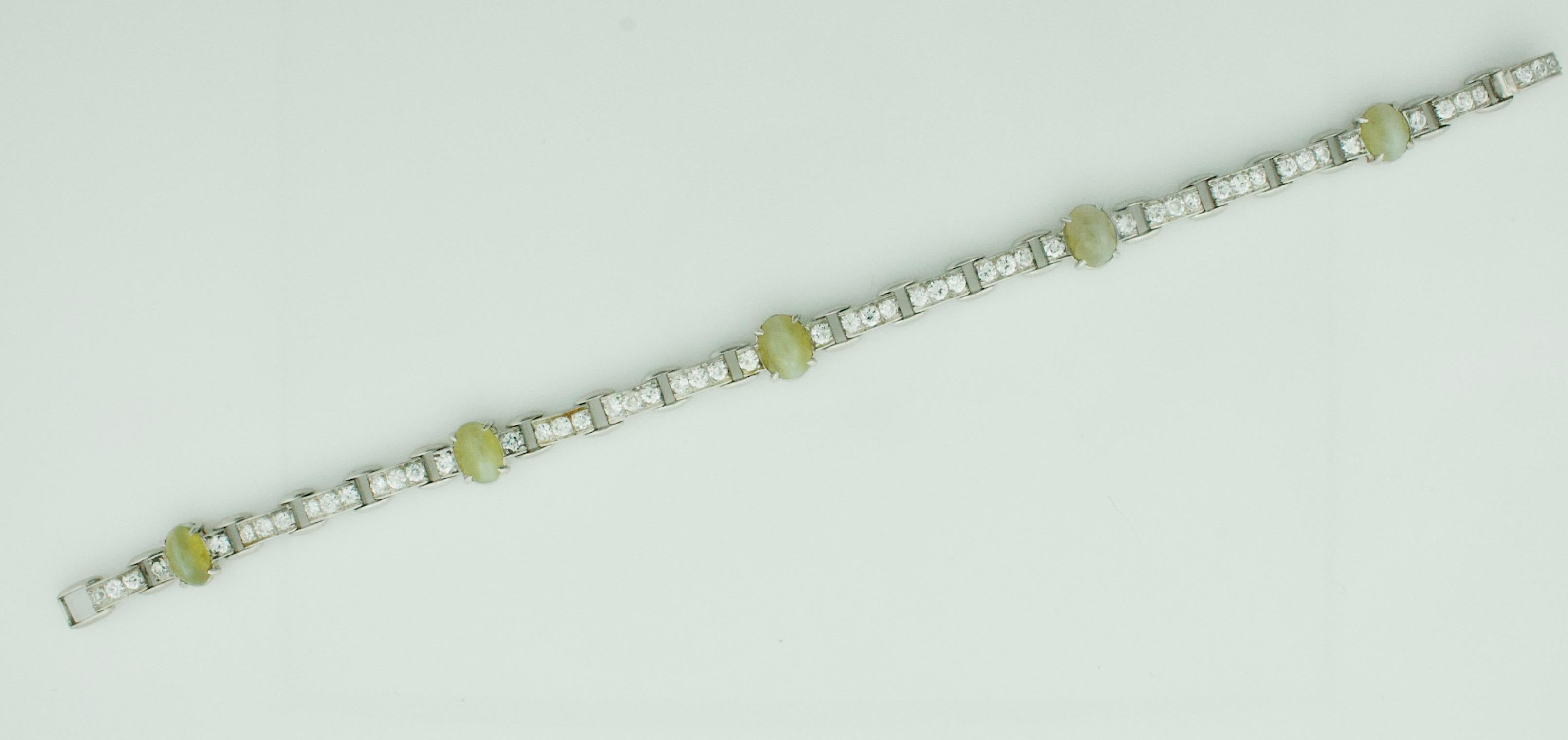 Cabochon Catseye and Diamond Bracelet in Platinum Circa 1940 by Wasslikoff For Sale