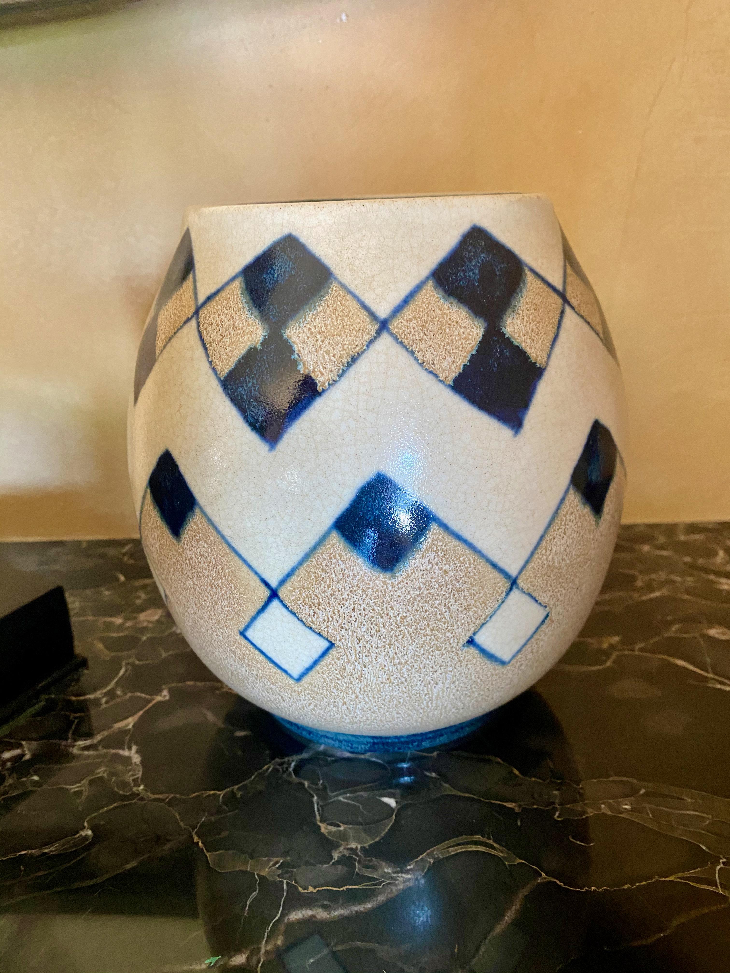 Charles Catteau Boch Freres Art Deco Geometric Stoneware vase. Rare and unusual ovid shape. Identified in the definitive catalog by Marc Paron on the life’s work of Charles Catteau on-page #454. Stoneware vases like these with a geometric pattern