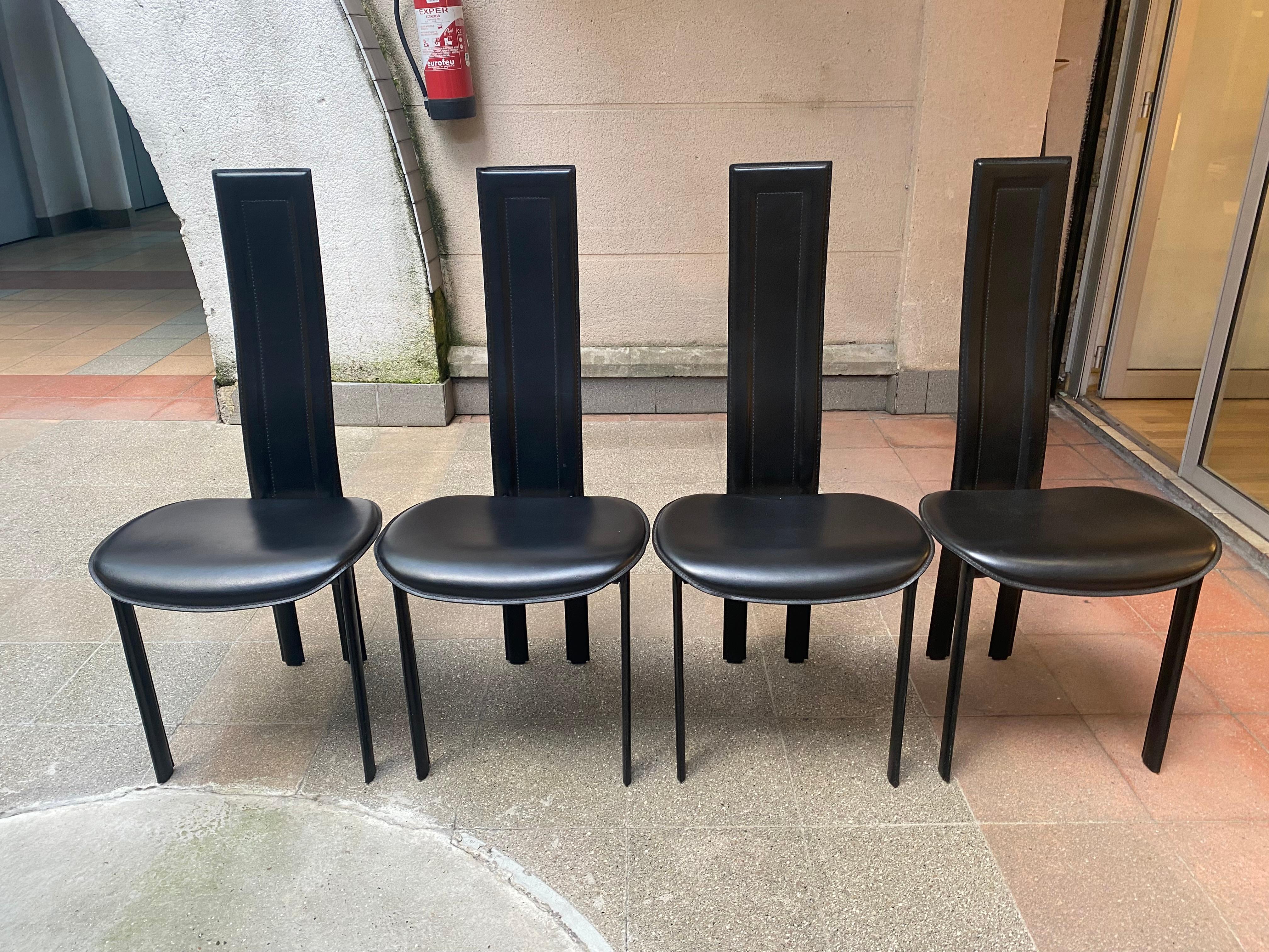 Cattelan Italia
Suite of 4 chairs
Circa 1980
Black leather / metal
106 x 49 x 45 cm 

Dimensions :
- Height: 106 cm
- Width : 49 cm
- Depth : 45 cm

Price : 890€.