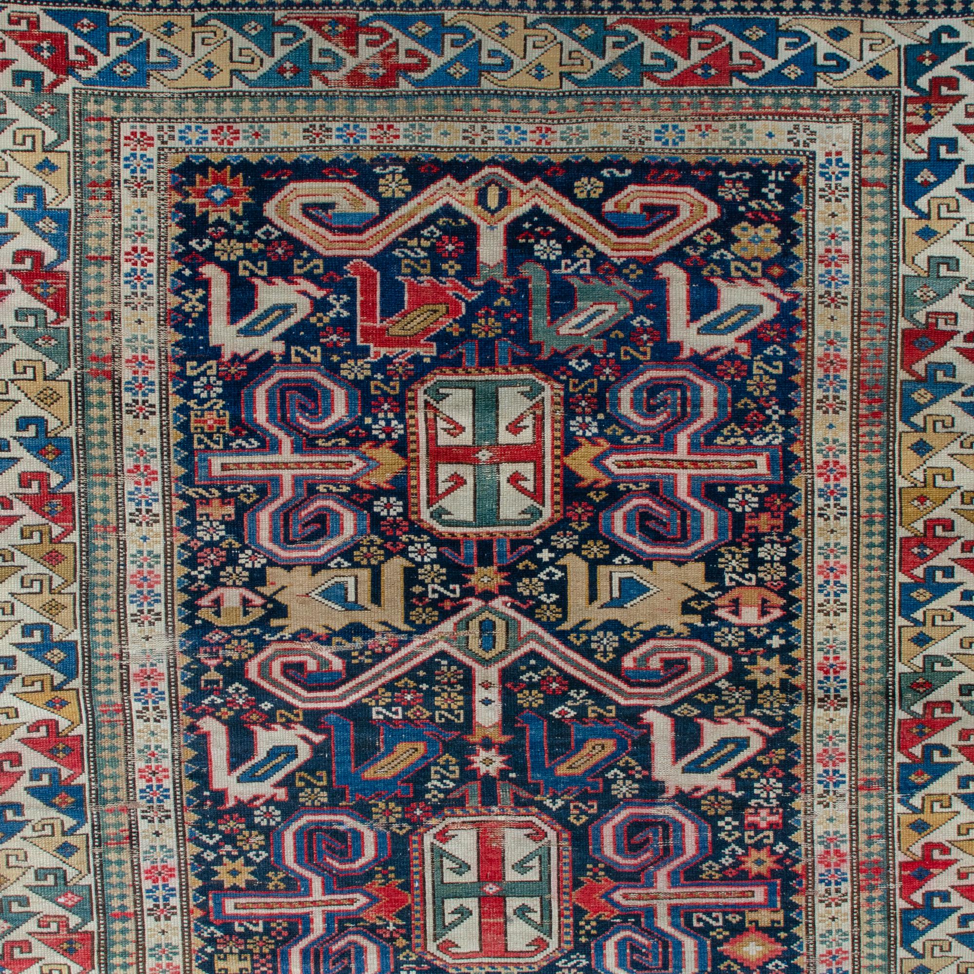 A unusual and collectible antique Caucasian Kuba district Perepedil rug, circa 1900.

An electric field with saturated colors surround the perepedil ram’s horn motif. With eagle’s beak border and other elements uncommon for a Perepedil rug.

45 ¾