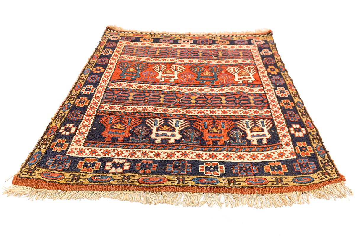 Caucasian Rug Shahsavan 19th Century
This  Shahsavan rug showcases distinctive tribal motifs and a vibrant, bold color palette. The piece prominently features stylized animal and tree motifs, traditional symbols common in Shahsavan weaving, set