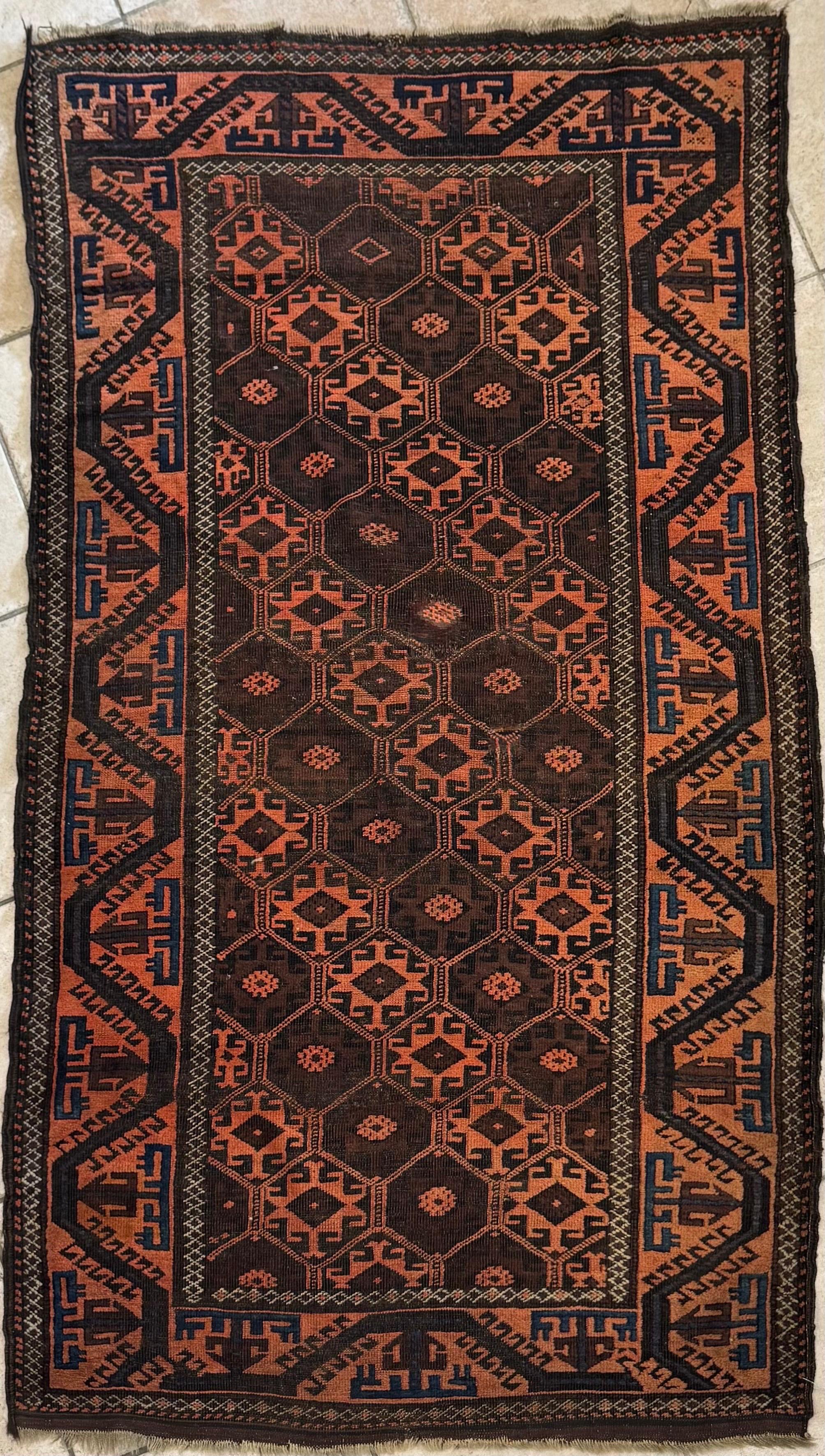 Caucasian Rust Brown Geometric Tribal Baluch Rug In Good Condition For Sale In New York, NY