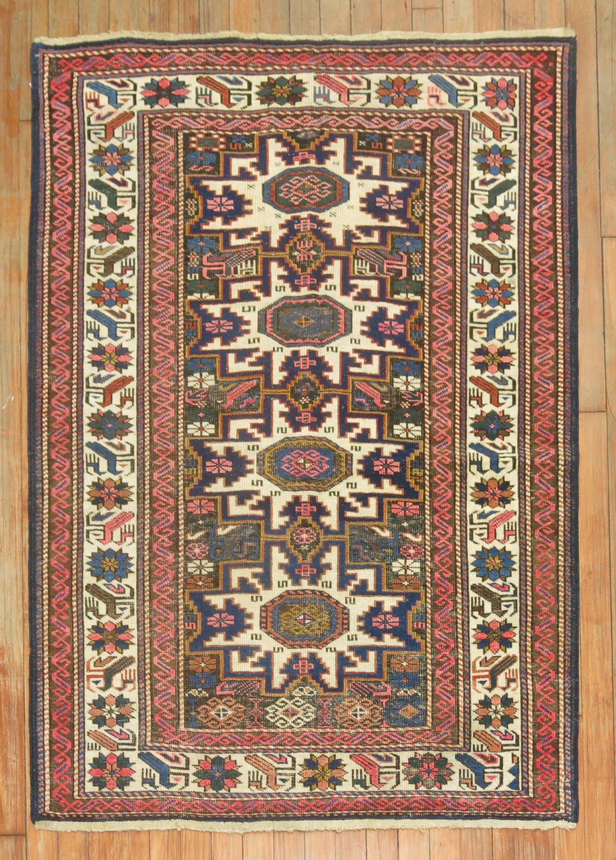 Early 20th century antique Caucasian rug 

Measures: 3'5'' x 4'8''.