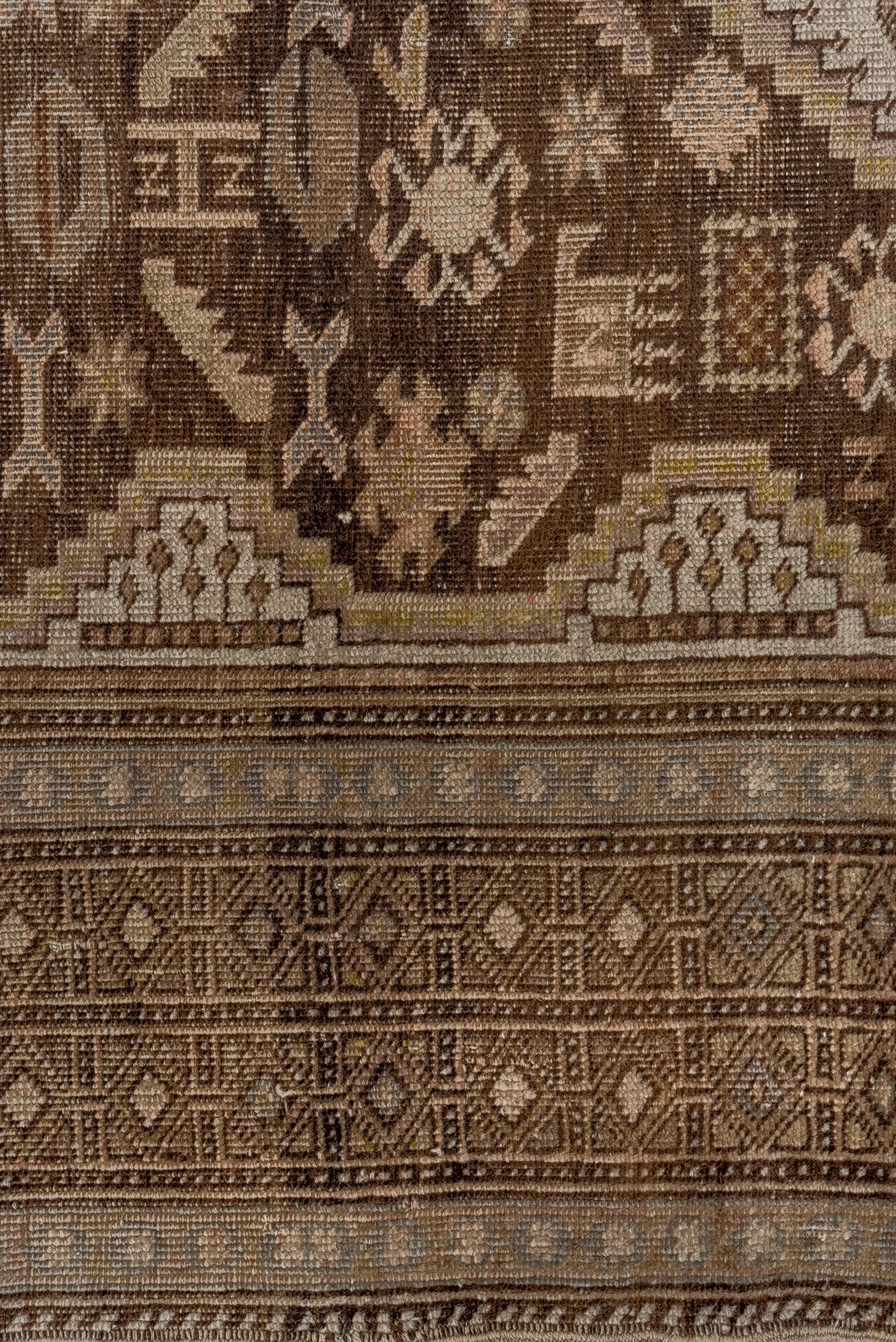 Wool Caucasian Tribal Rug in Olives and Browns For Sale