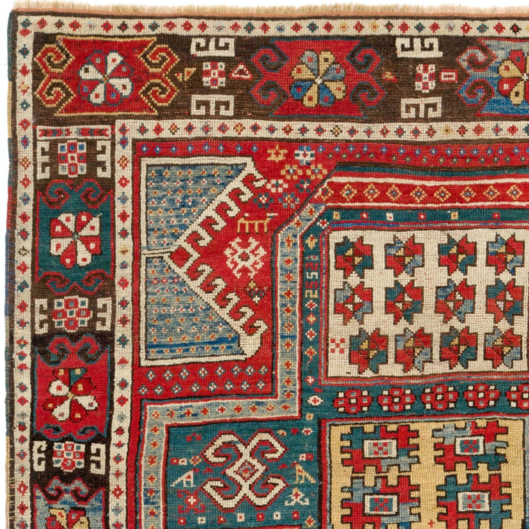 This fantastic work of textile art is from a very rare and small group of antique Kazak Rugs woven around Lake Sewan in Southern Caucasus. Dated 1860.
Fascinating natural dyed colors and a beautiful design, depicting a stylized shield pattern