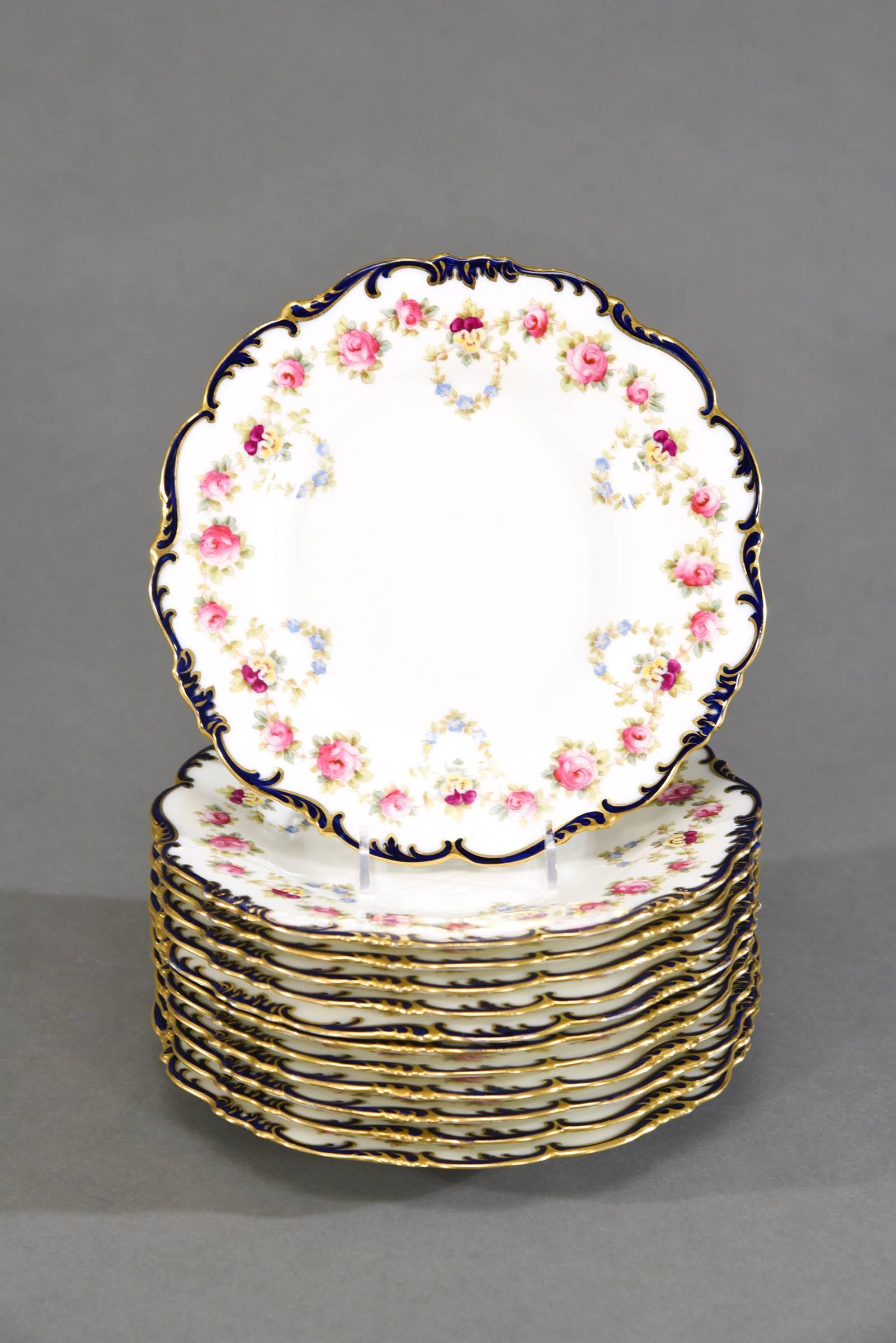 This is a complete dessert set that includes 16 pieces made by Cauldon, England. There are 12 Dessert Plates measuring 8.75 x .75, a round serving bowl, 2 oval bowls and a footed tazza. This combination offers a wonderful selection for 1st course to