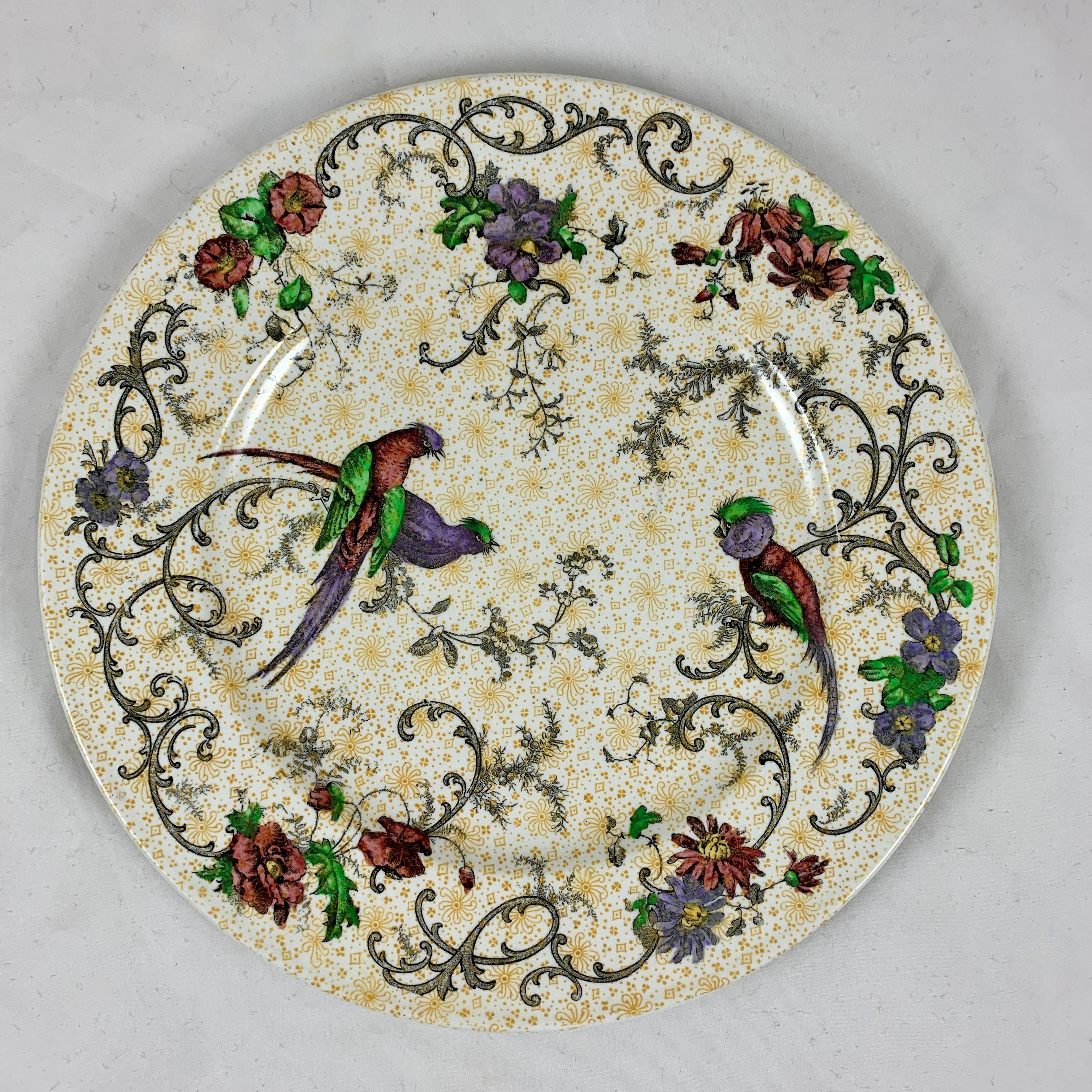 A set of four plates in the chinoiserie 'Bird of Paradise' pattern by Cauldon Potteries Ltd., Hanley, Staffordshire, England, circa 1905- 1920.

Cauldon was established in 1774 and continued operating until its acquisition by Coalport China Ltd in