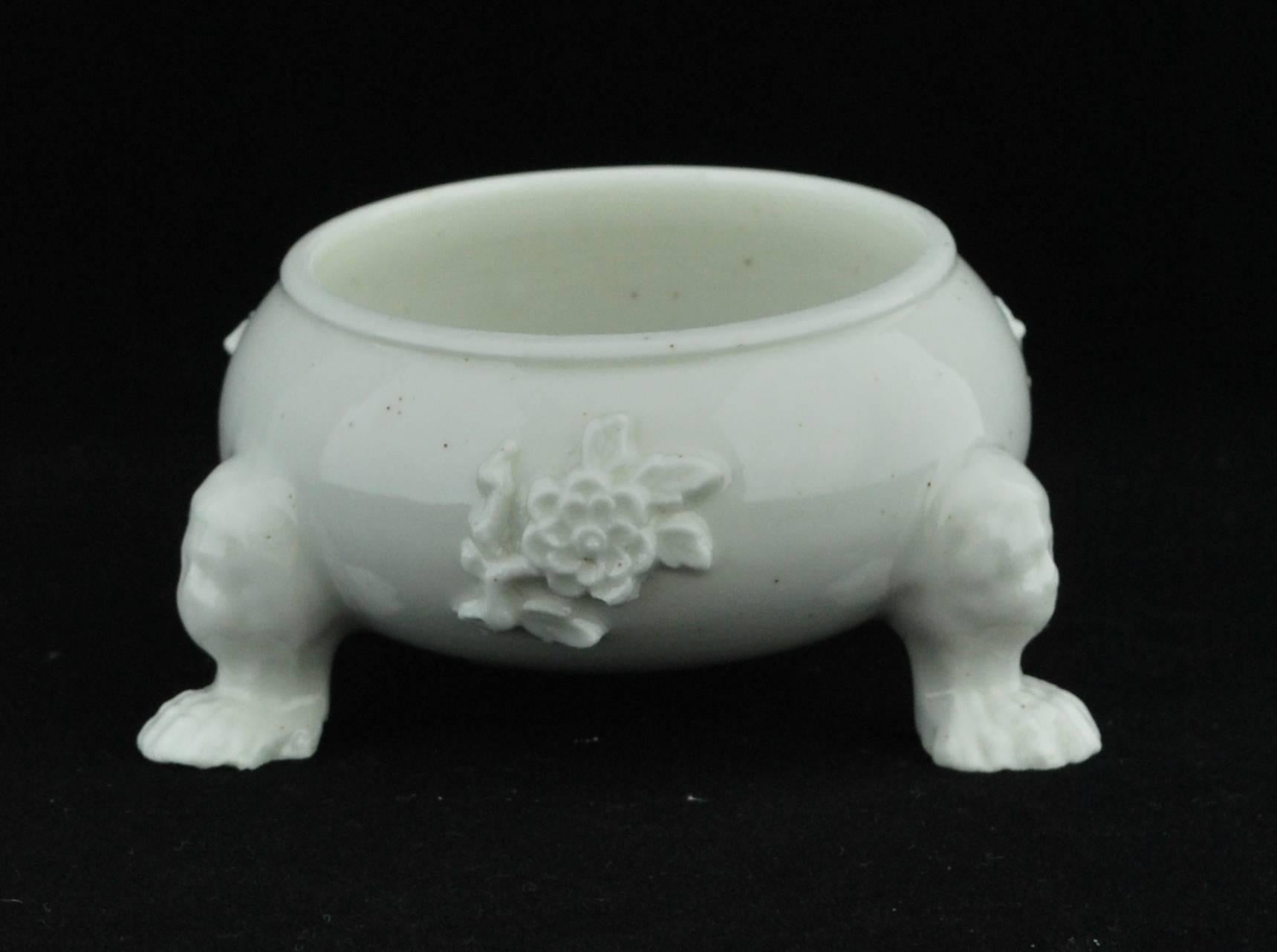 A cauldron-shaped salt: a direct copy of a contemporary (Georgian) silver shape in soft-paste porcelain.

Provenance: Taylor collection.