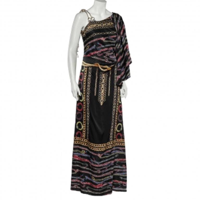 How pretty is this dress from Cavalli Class! It is created using black printed satin fabric and features a flared sleeve, a maxi-length style, and zipper fastening. Elevate your style by wearing this Cavalli Class creation.