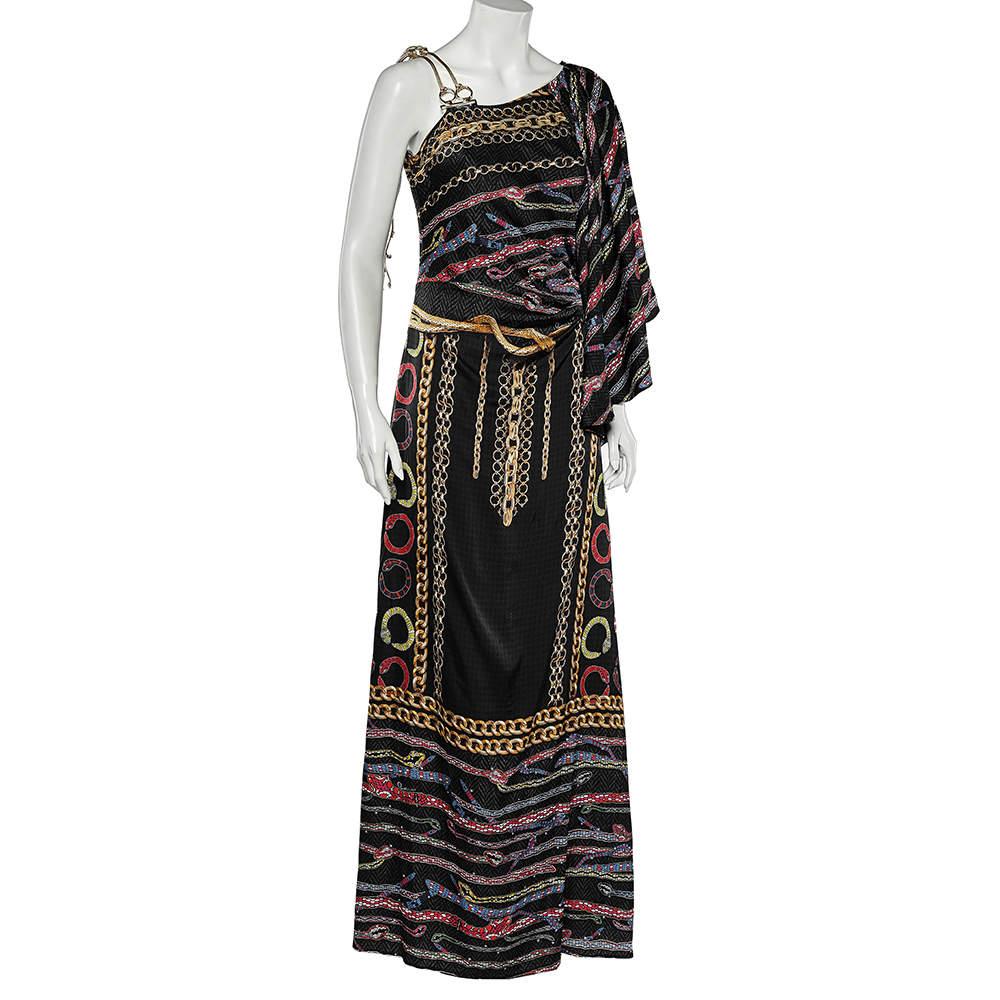 How pretty is this dress from Cavalli Class! It is created using black printed satin fabric and features a flared sleeve, a maxi-length style, and zipper fastening. Elevate your style by wearing this Cavalli Class creation.

