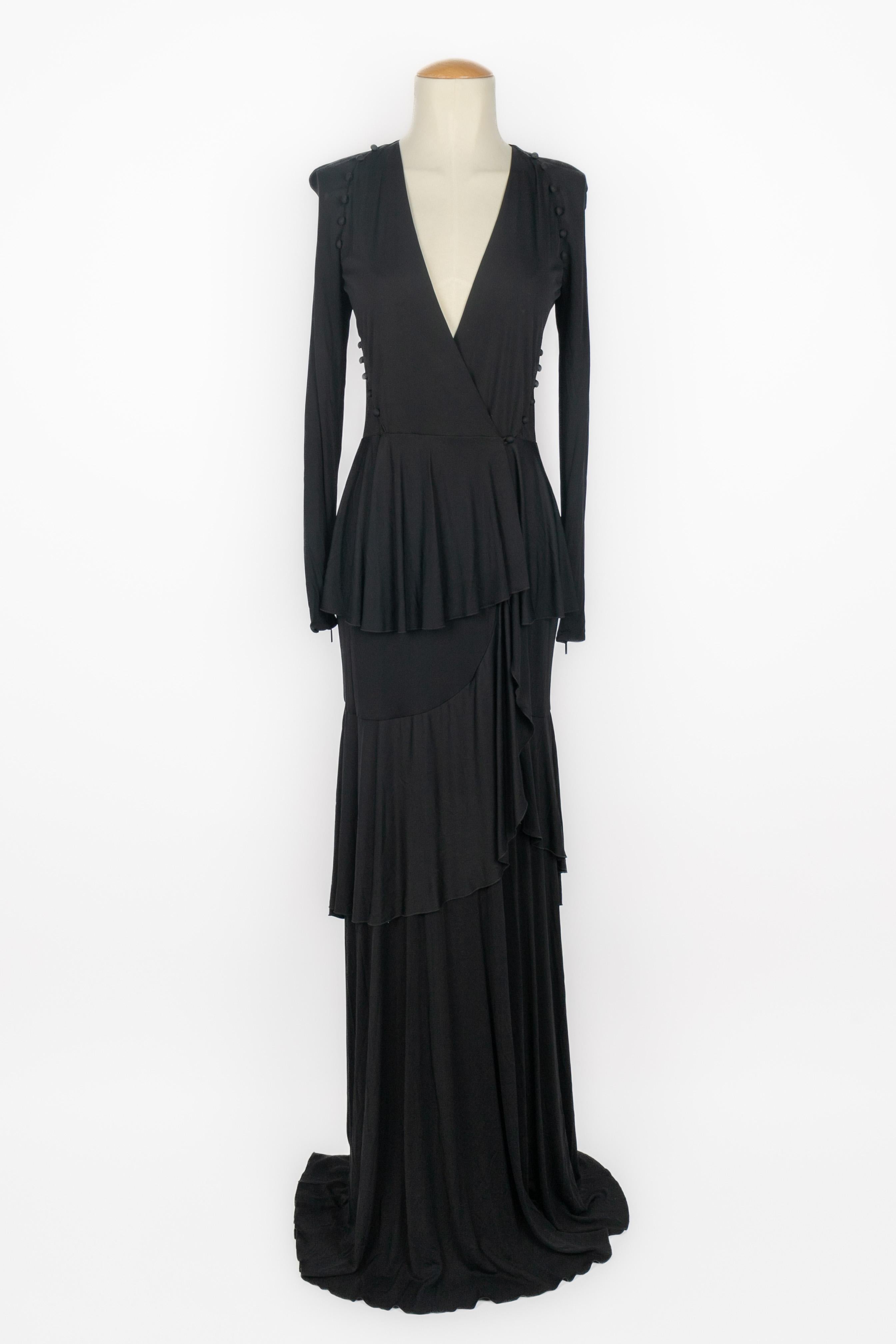 CAVALLI - (Made in Italy) Long black stretch viscose dress with a front split. V-neck. Size 42IT.

Condition:
Very good condition

Dimensions:
Shoulder width: 39 cm - Chest: 38 cm - Waist: 34 cm - Sleeve length: 60 cm - Length: 170 cm

SKU:VR478