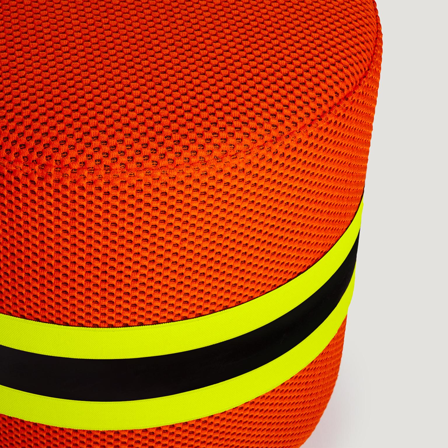 Stool with polyurethane base upholstered in Body Building fabric with elastic synthetic bands in neon yellow and black.
In “Body Building” the objects are dissected and studied, designed to elude the perception of the viewer, to discover a world