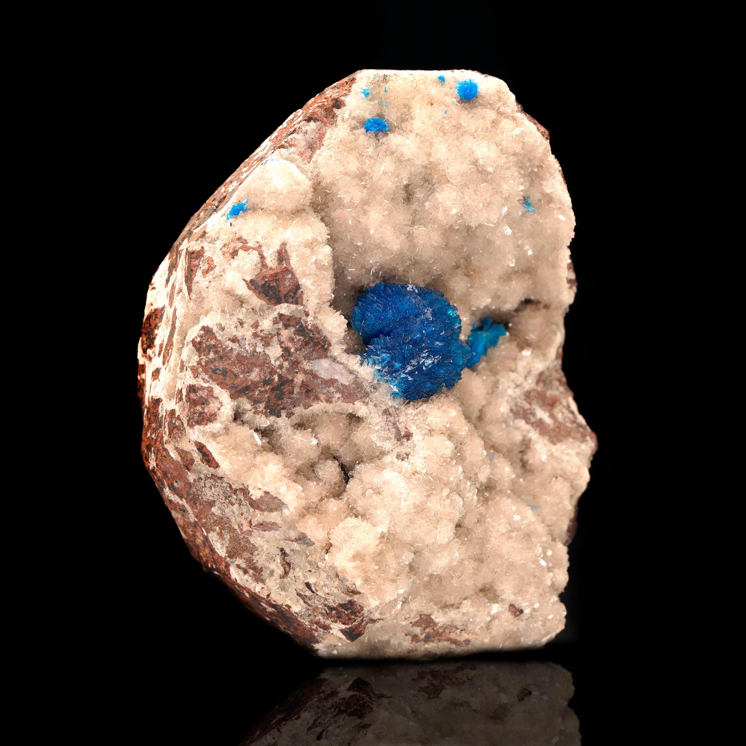 This incredible specimen features a deep-blue cavansite crystal cluster on a creamy stilbite matrix. The contrast between the cavansite and the matrix creates an eye-catching piece. Originating from the renowned Wagholi Quarry in India, this piece