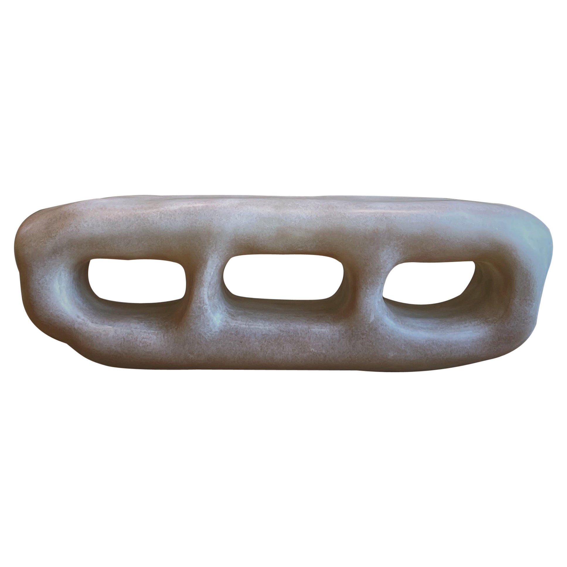 Cave Inspired Form, Armario de fibra de vidrio beige natural con tres aberturas by kar