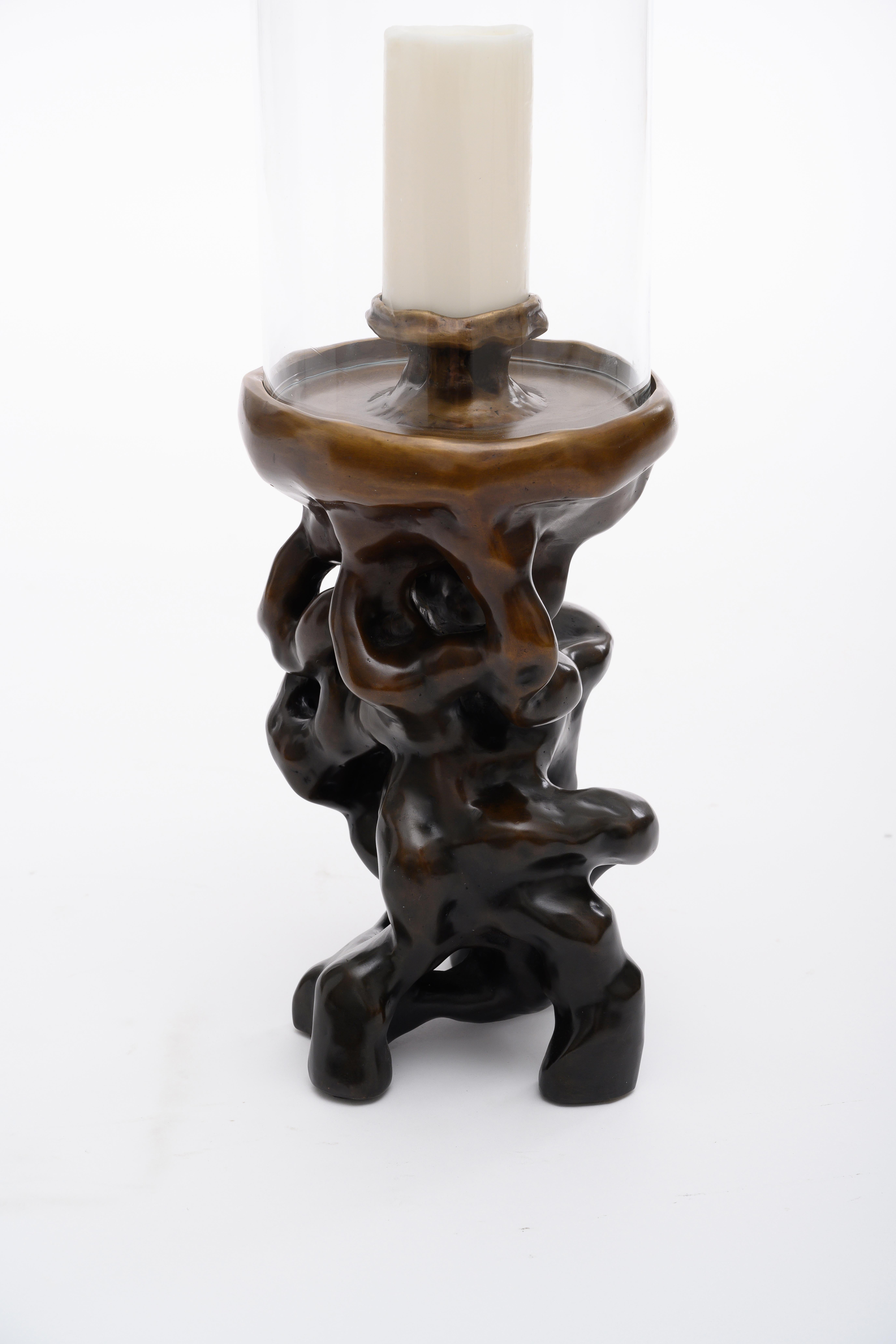 Cavee Hurricane in Antique Bronze with Glass Shade from Elan Atelier

Inspired by the Chinese Scholars' stones, the cave hurricane candle stand is a sculptural beauty in cast bronze with glass shade. Comes standard in our gradually darkening flaxen