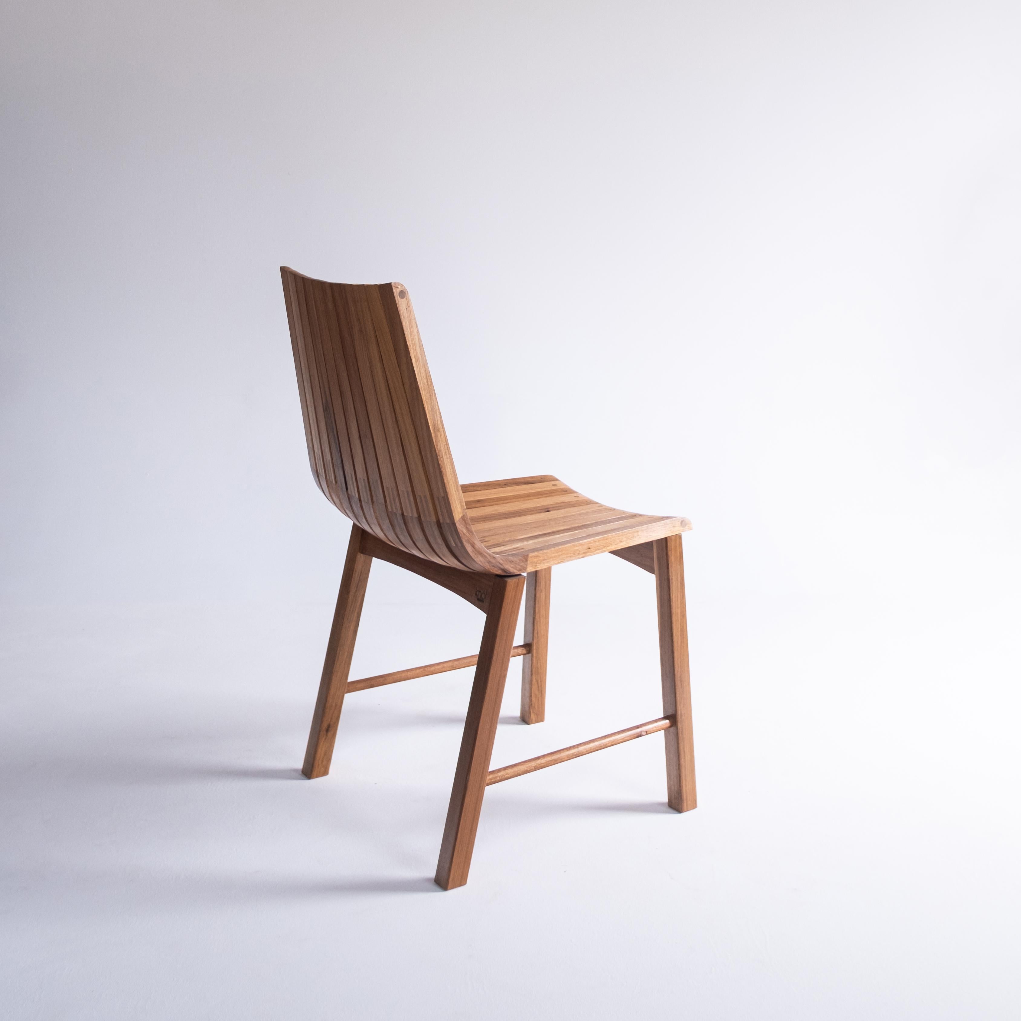 Woodwork 'Caverna' contemporary wooden dining chair by Brazilian Studio Knót Artesanal For Sale