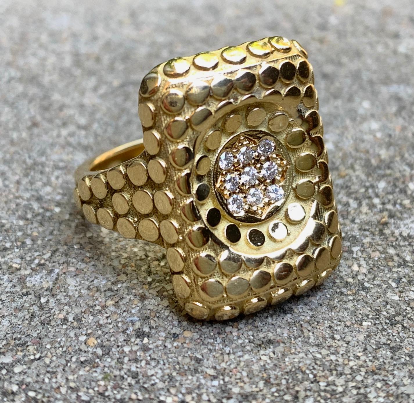This gorgeous and commanding ring is a contoured rectangular slab featuring Eytan Brandes' 