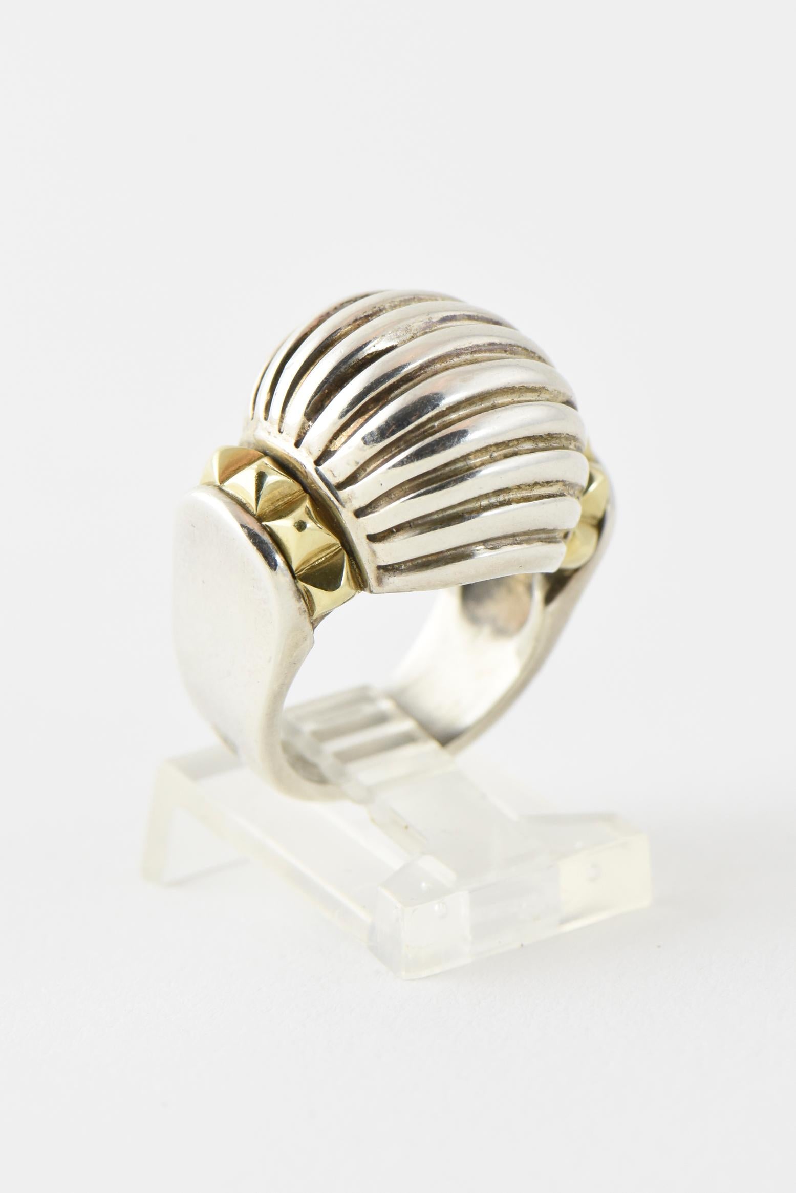 Caviar sterling silver ribbed dome ring with 18K gold pyramid accents on the sides. Marked: Caviar 750 925. U.S. size: 5; can be sized. Minor scratches, dings.