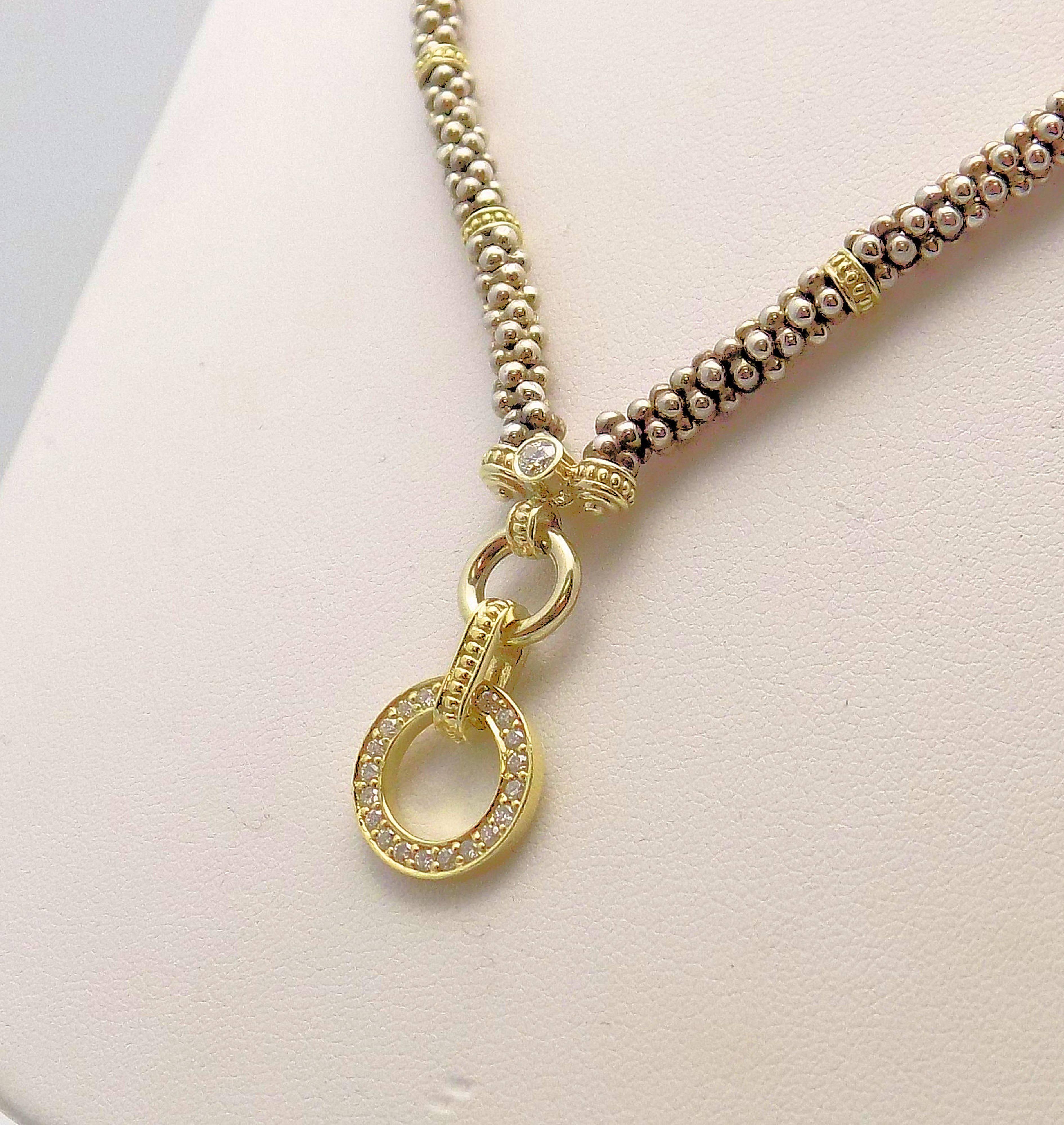 Very Popular 18 Karat Yellow Gold and Sterling Silver Necklace in the Caviar Style with a Round Pendant featuring 21 Round Brilliant Diamonds 0.40 Carat Total Weight, SI, H, 16