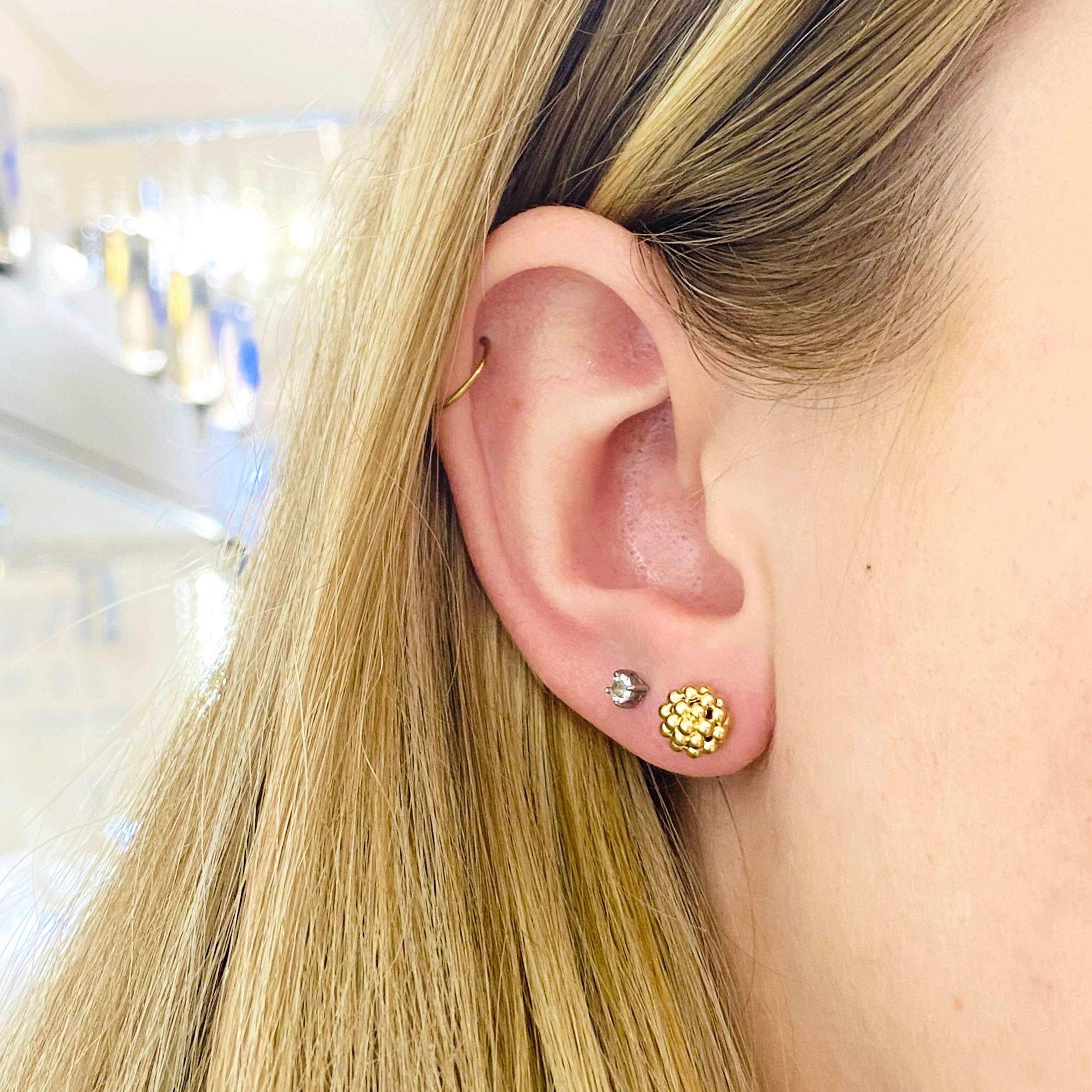 These stunning  cavier 14k yellow gold detailed beaded dome earrings provide a look that is both trendy and classic. These earrings are a great staple to add to your collection, and can be worn with both casual and formal wear.  These earrings would