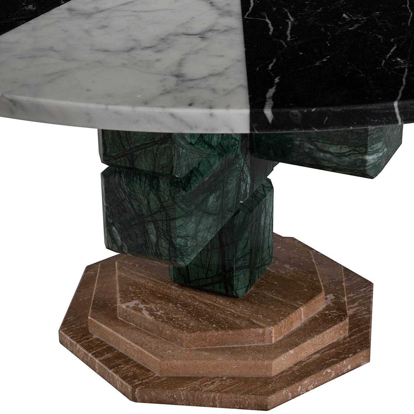 Boasting the natural strength and sophistication of marble, this coffee table can be used to make a statement in a modern or eclectic interior, either alone or combined with other pieces in the Caxus limited series. This piece features a round base