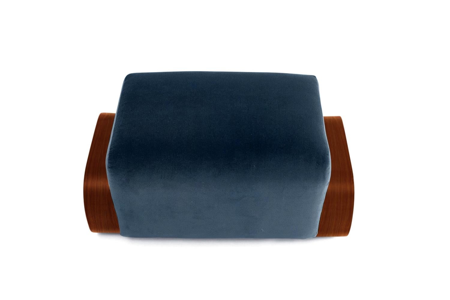 The Cayenne lounge chair and ottoman are a deft homage to midcentury design. Designer Marie Burgos has taken the clean lines that defined seating designs of that era and given them a luxurious new simplicity. The plush upholstery — available in a