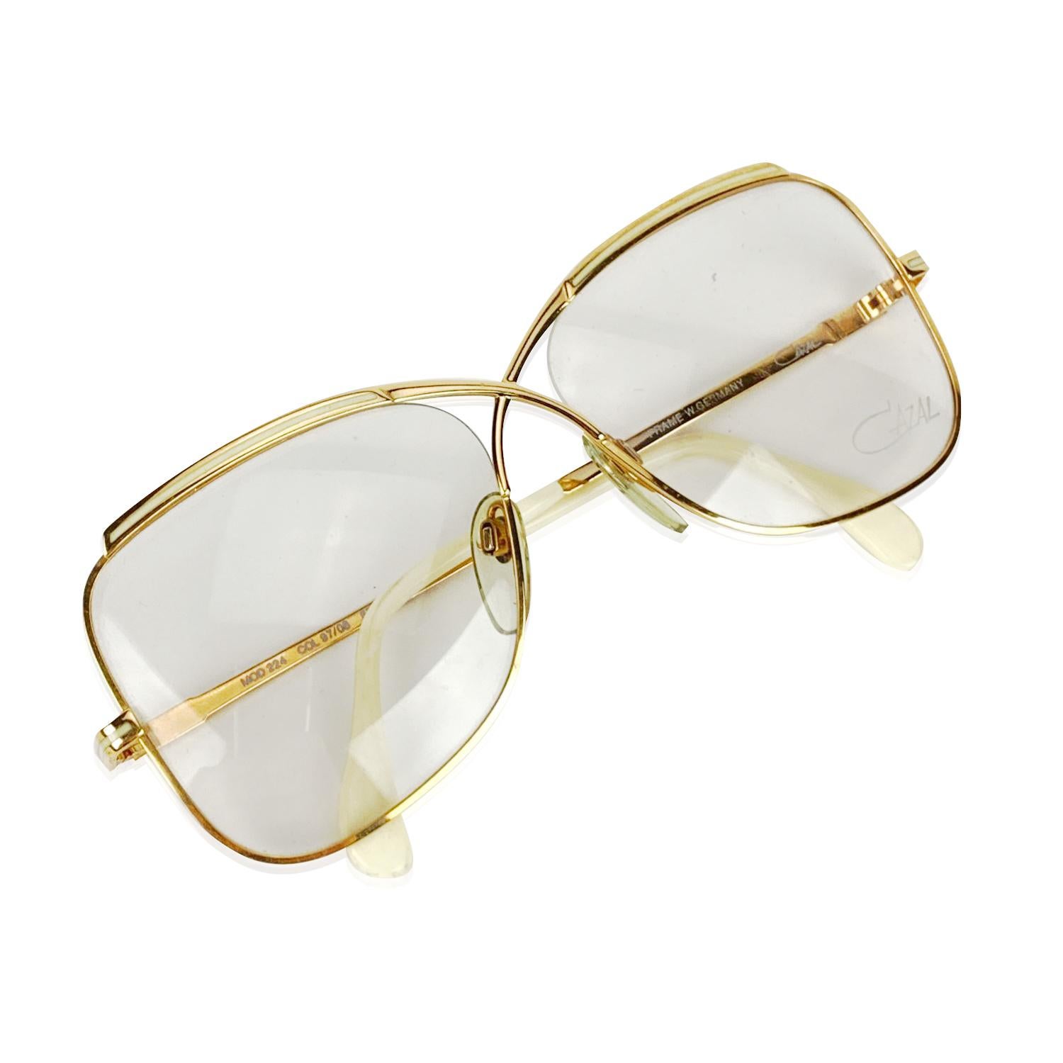 Rare, Vintage Eyeglasses by CAZAL Mod. 224, from the 80s. Made in West Germany. Gold metal frame. with ivory accents. Clear / trasparent DEMO lens, with CAZAL signature. Model refs: Mod. 224 - Col. 97/08 - 57/14 - 130




Details

MATERIAL: